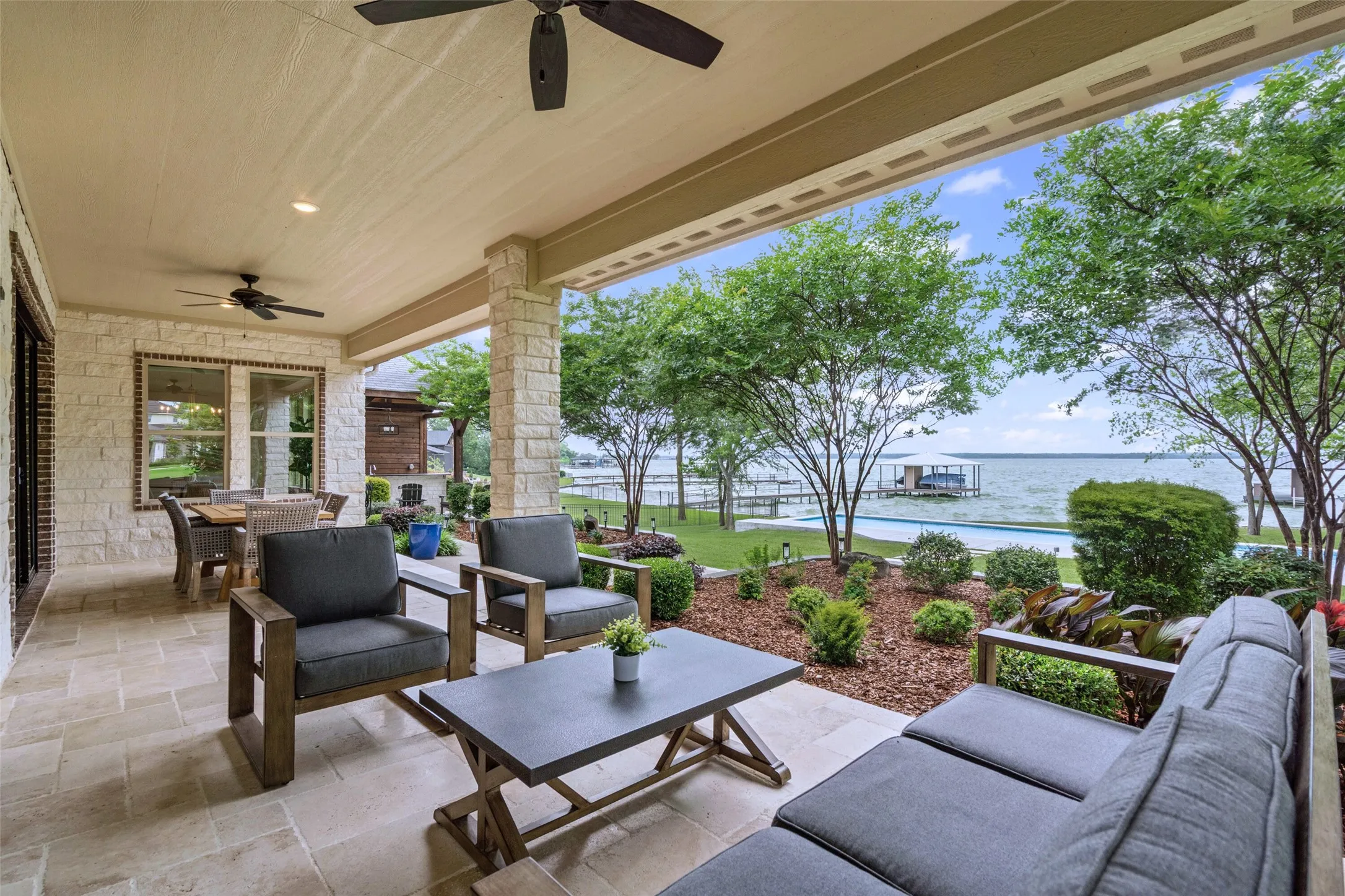 Relax on the patio outside the primary suite and take in the lake breeze.