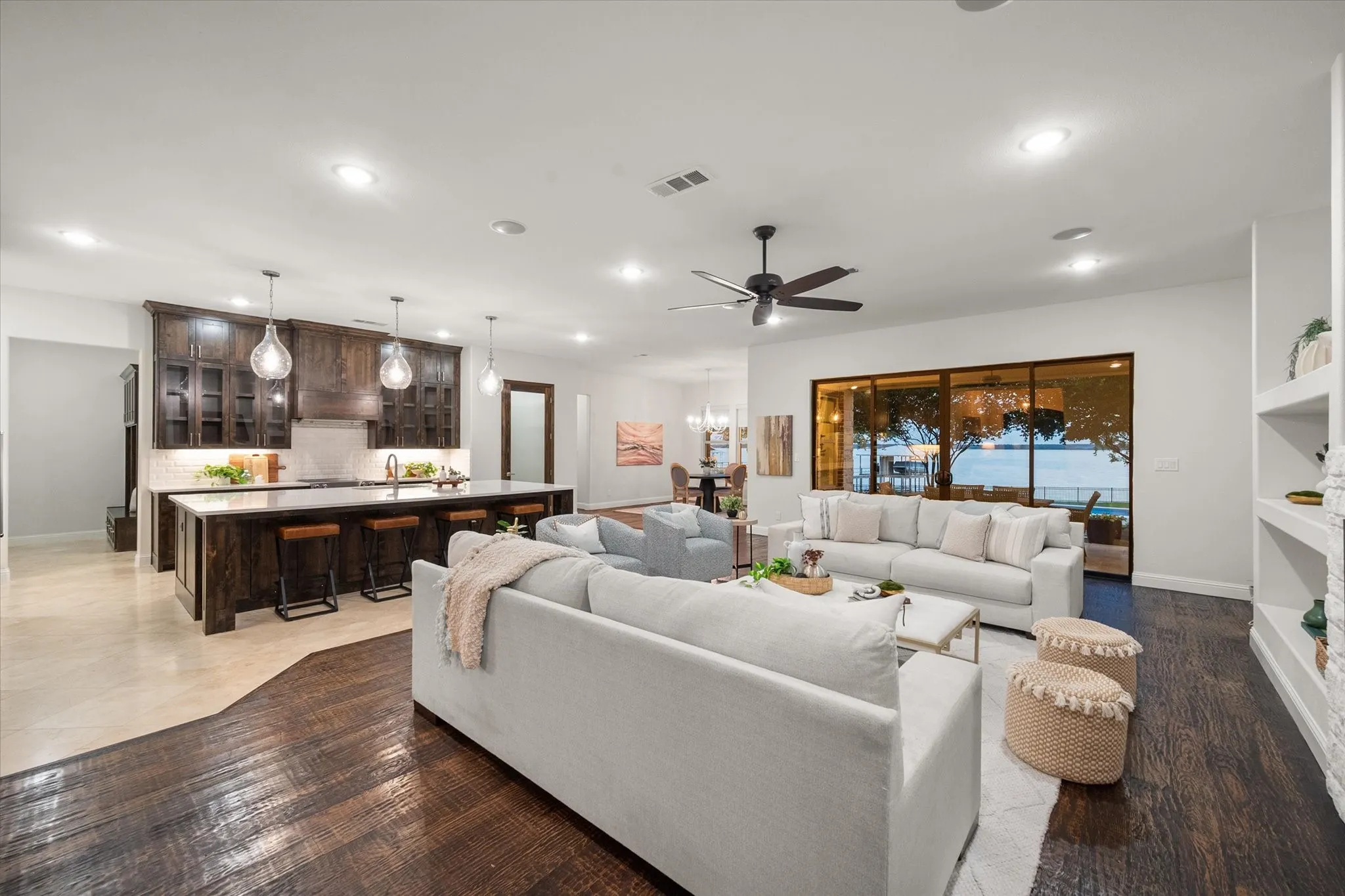Thoughtfully designed, the kitchen, dining, and living areas are all oriented toward breathtaking lake views.