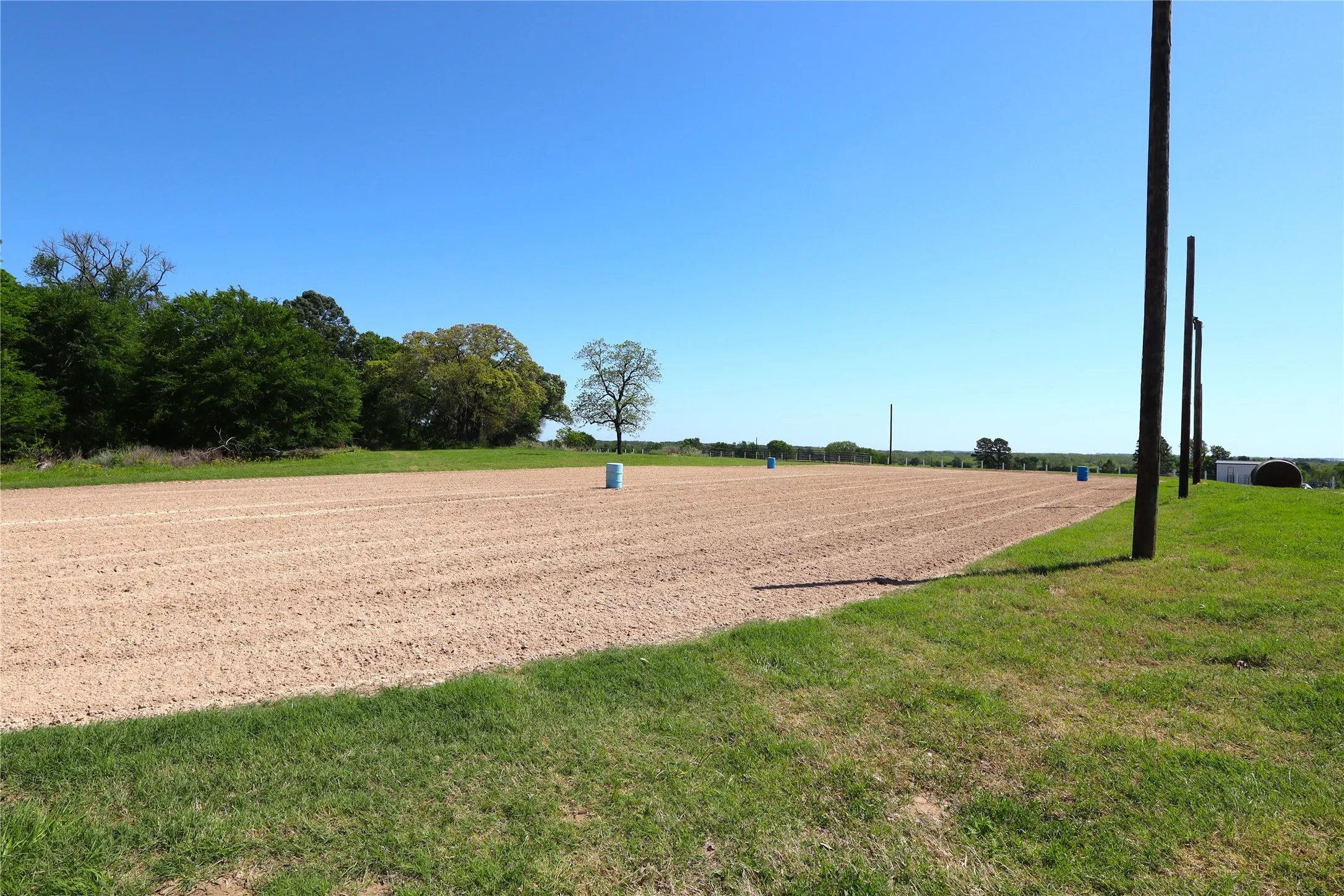View of community with a yard and a rural view