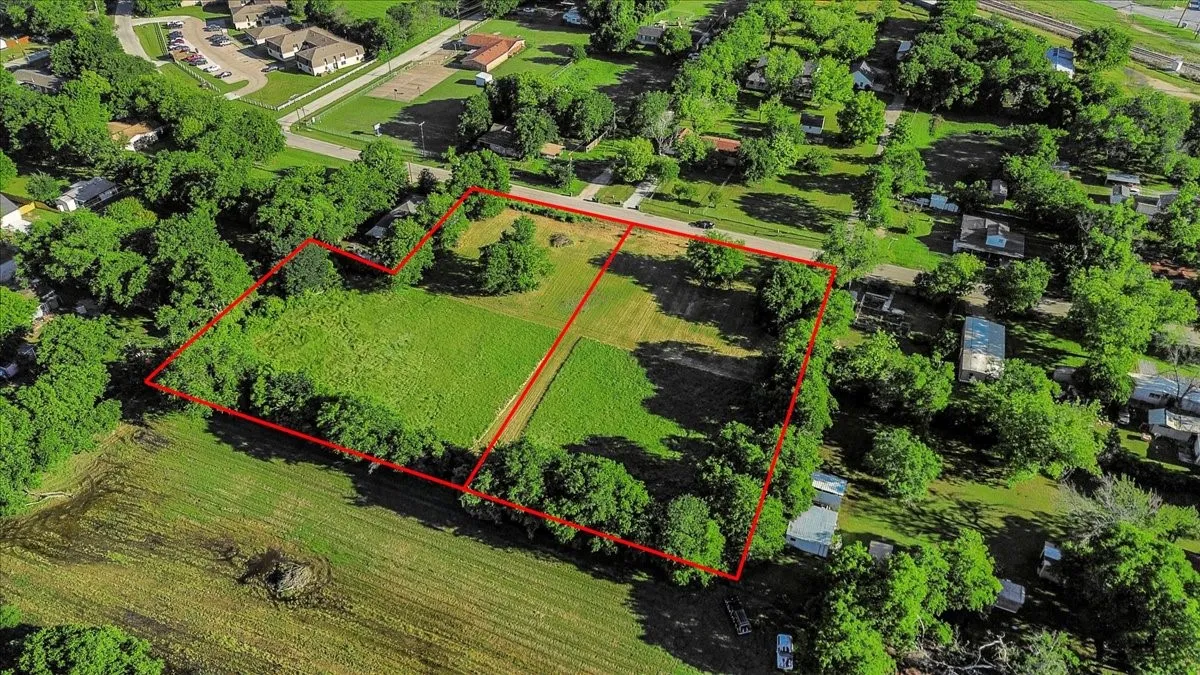 Aerial overview of property's location with property parcel outlined