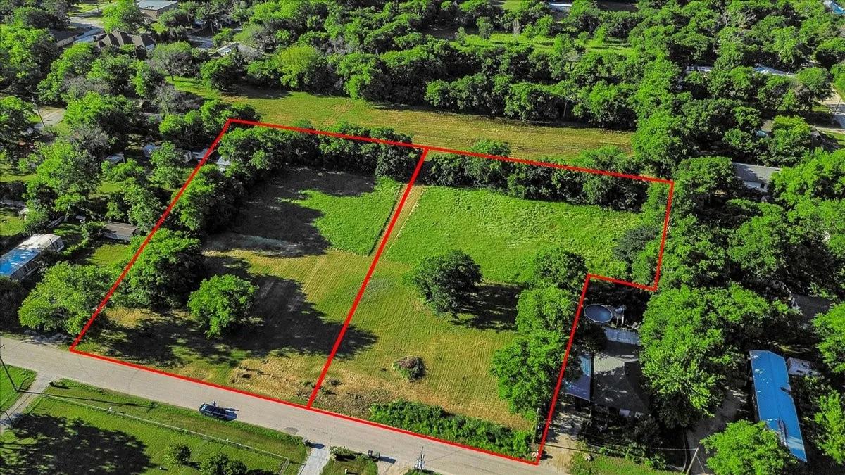 Aerial overview of property's location with property parcel outlined