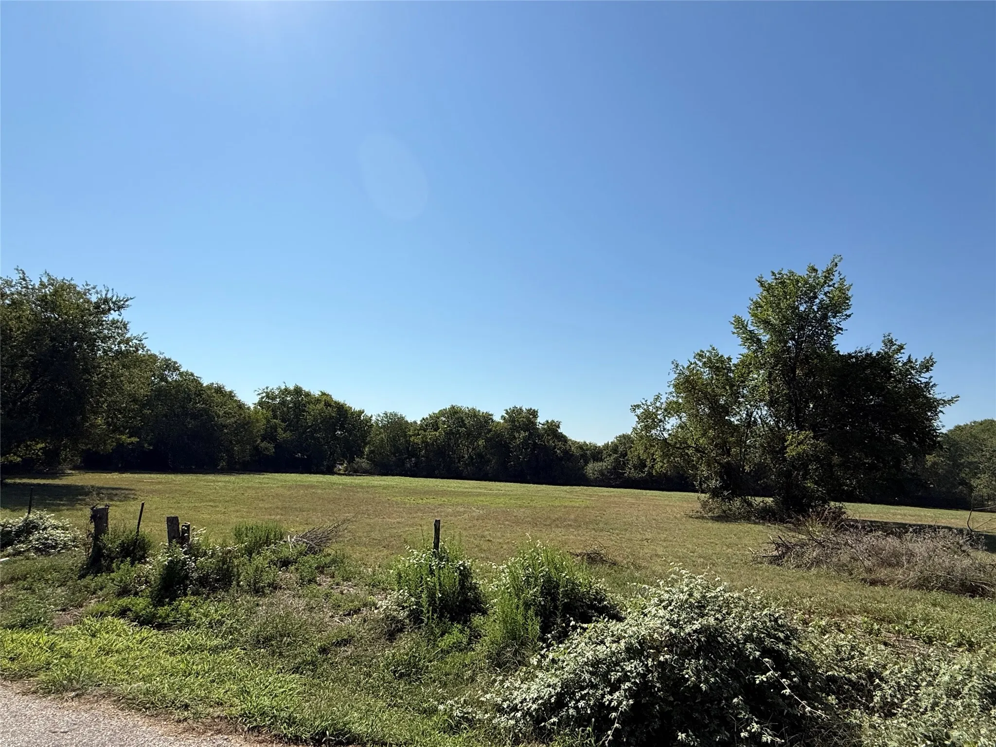 View of yard with a view of countryside and a wooded view