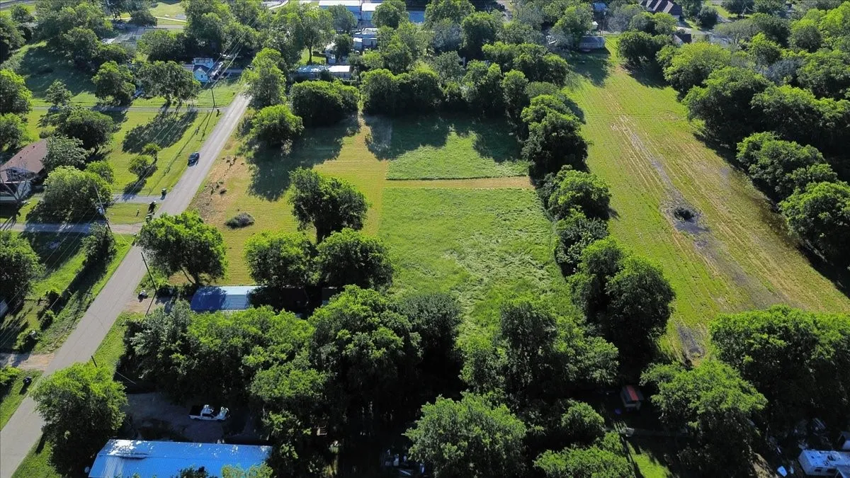 Aerial view of property and surrounding area with rural landscape