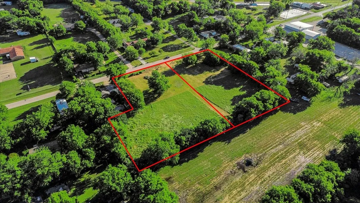 Aerial overview of property's location featuring property boundaries highlighted