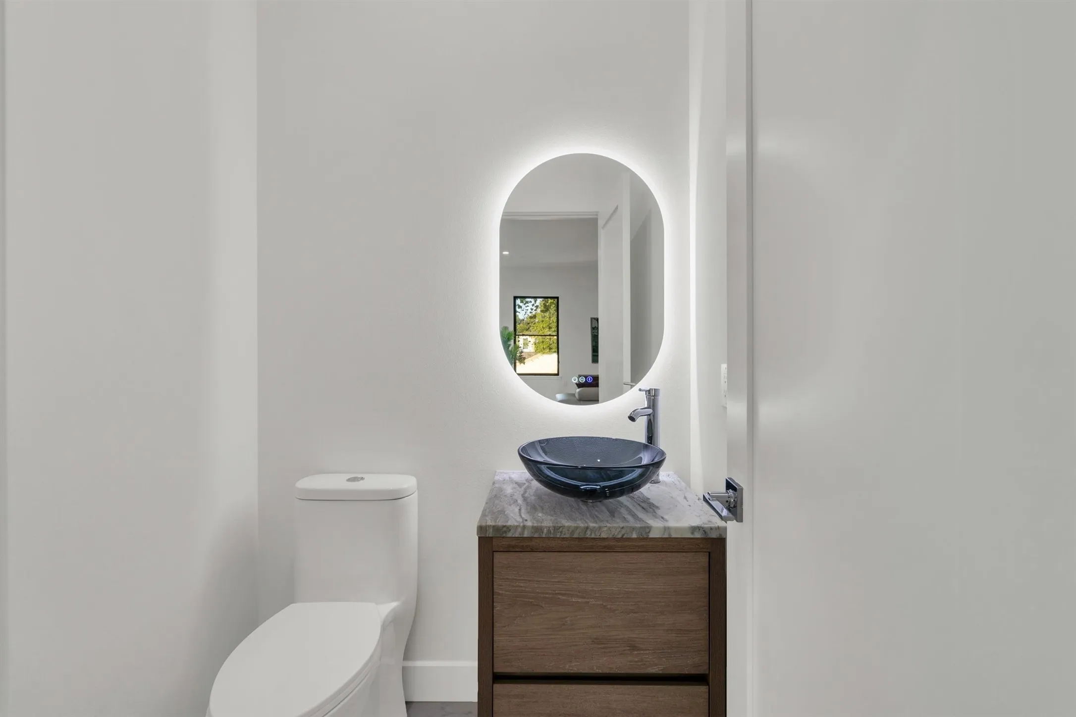 Bathroom featuring toilet and vanity
