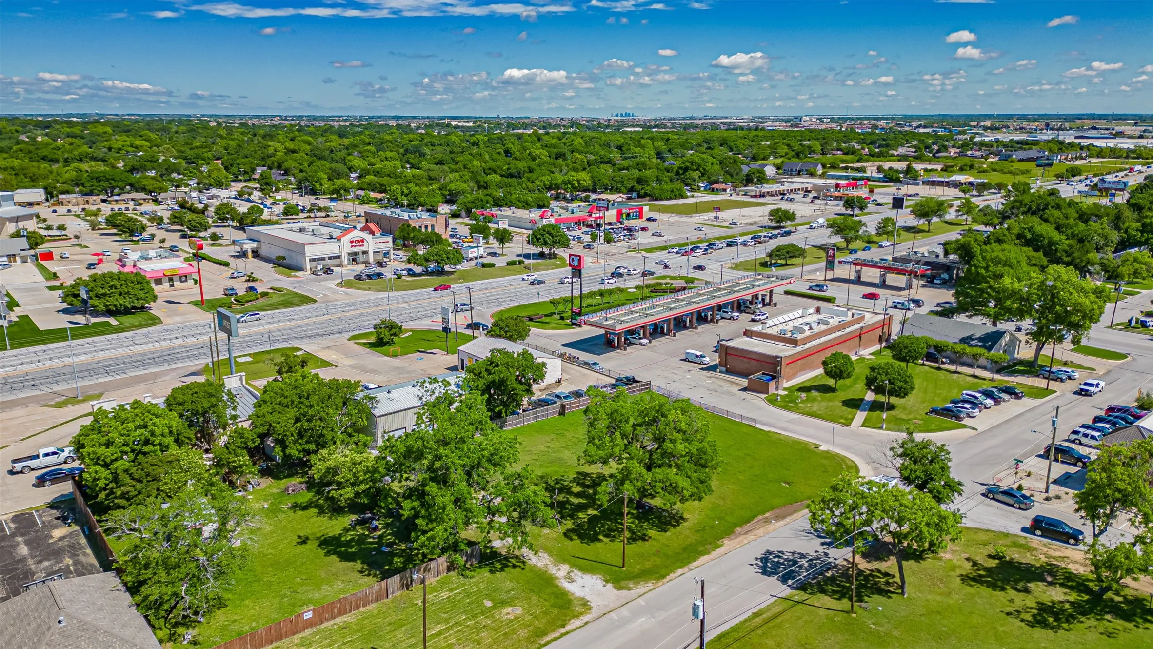 Drone / aerial view of a tree filled landscape