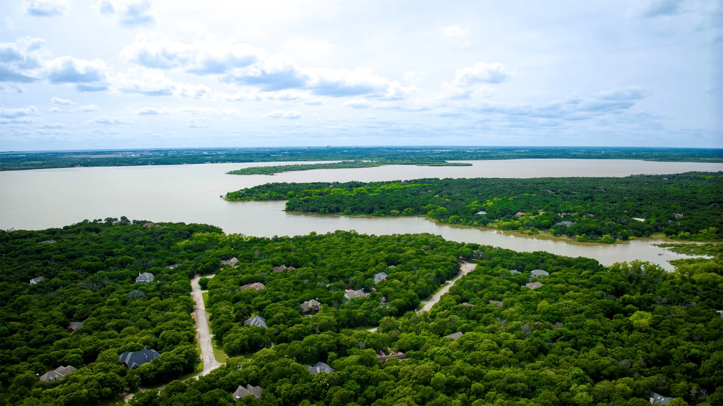 Aerial view of community showcasing Lake Lewisville.