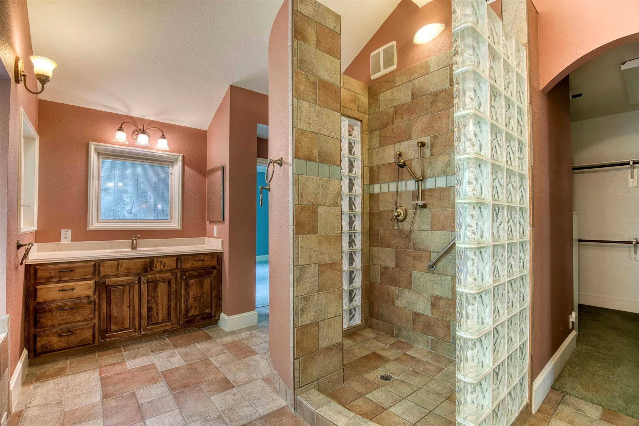 En-suite bath with luxury shower.