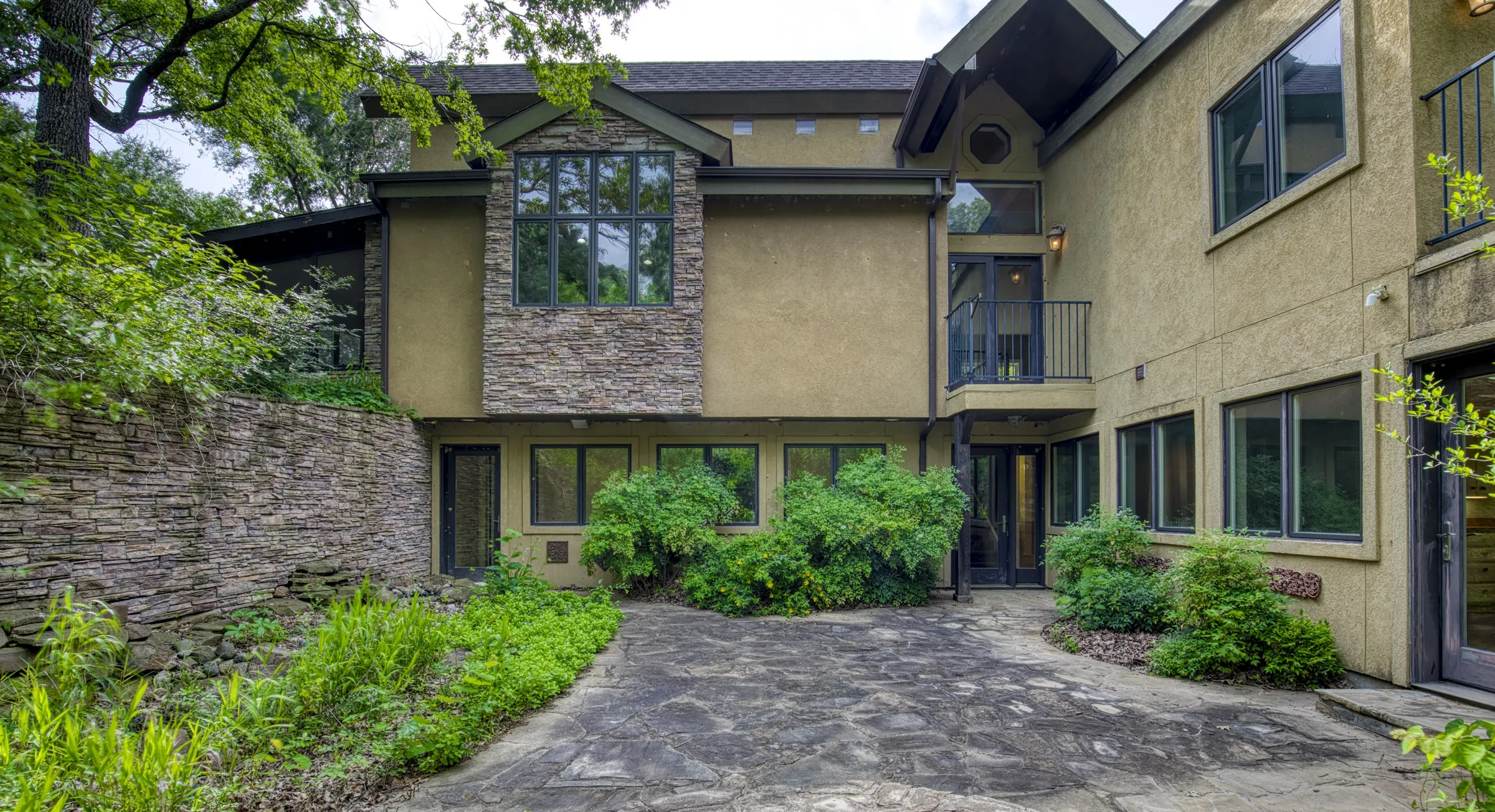 Back of home showcasing courtyard.
