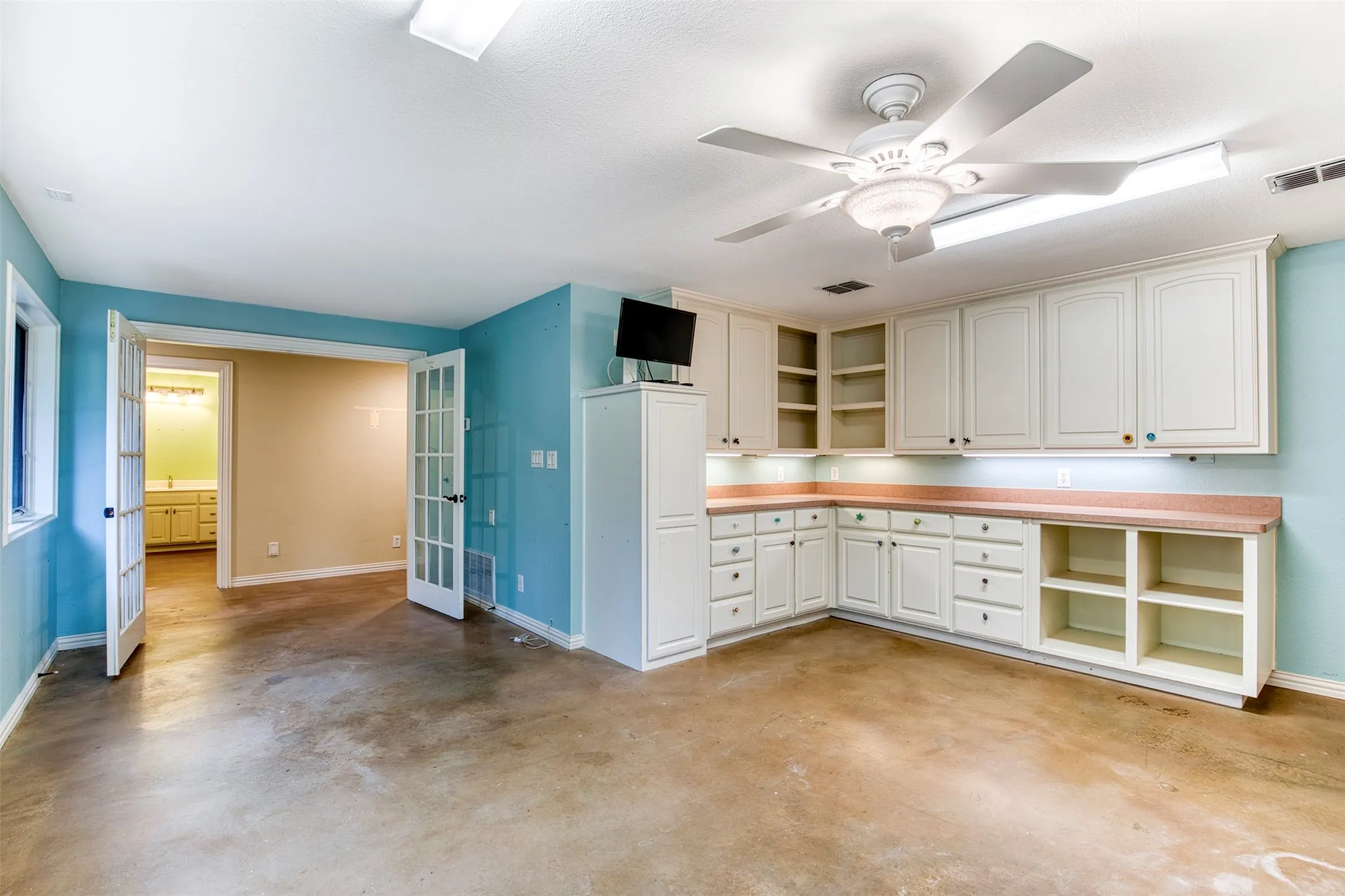 Downstairs bonus room with built-ins.