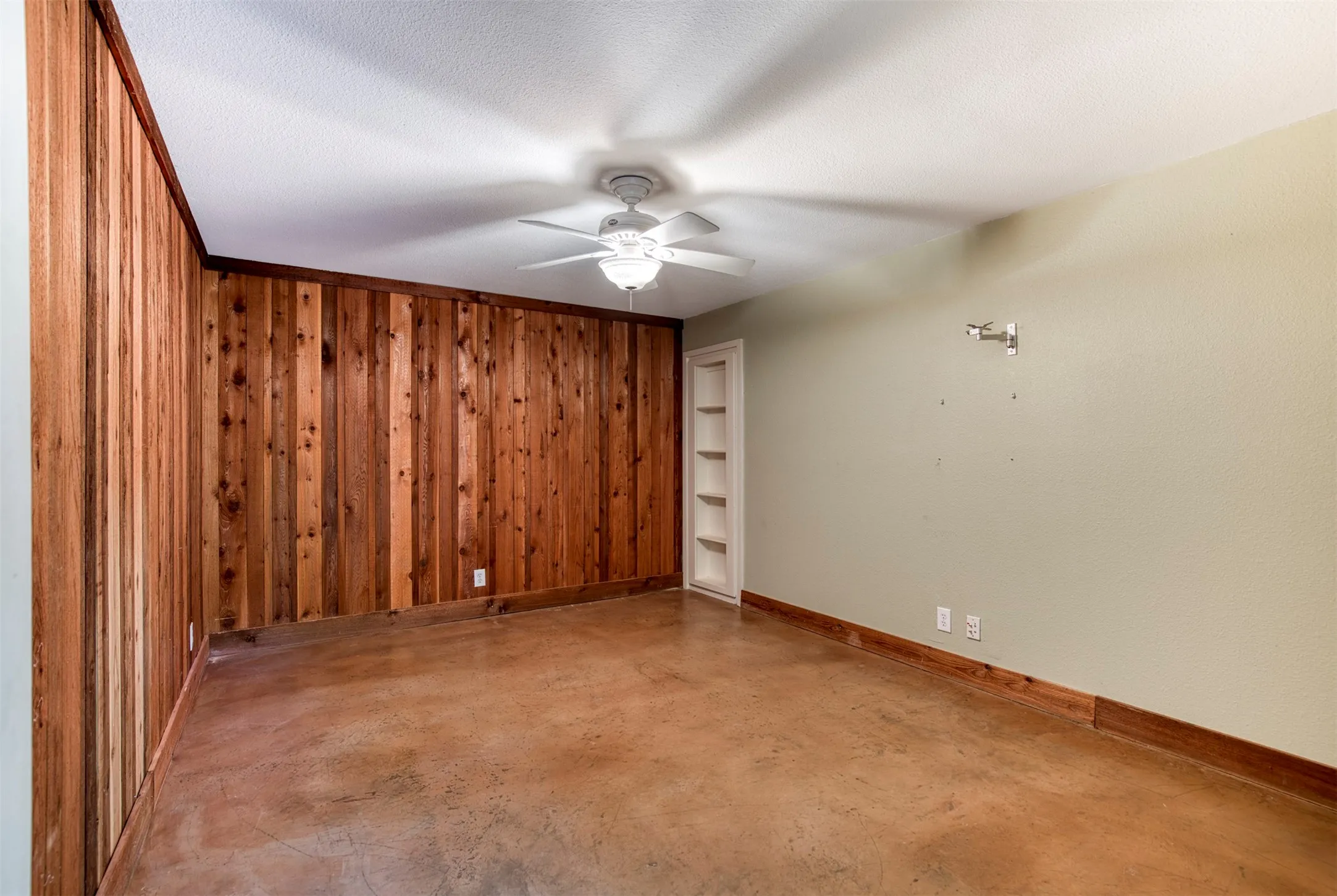 Downstairs bedroom with built-in.
