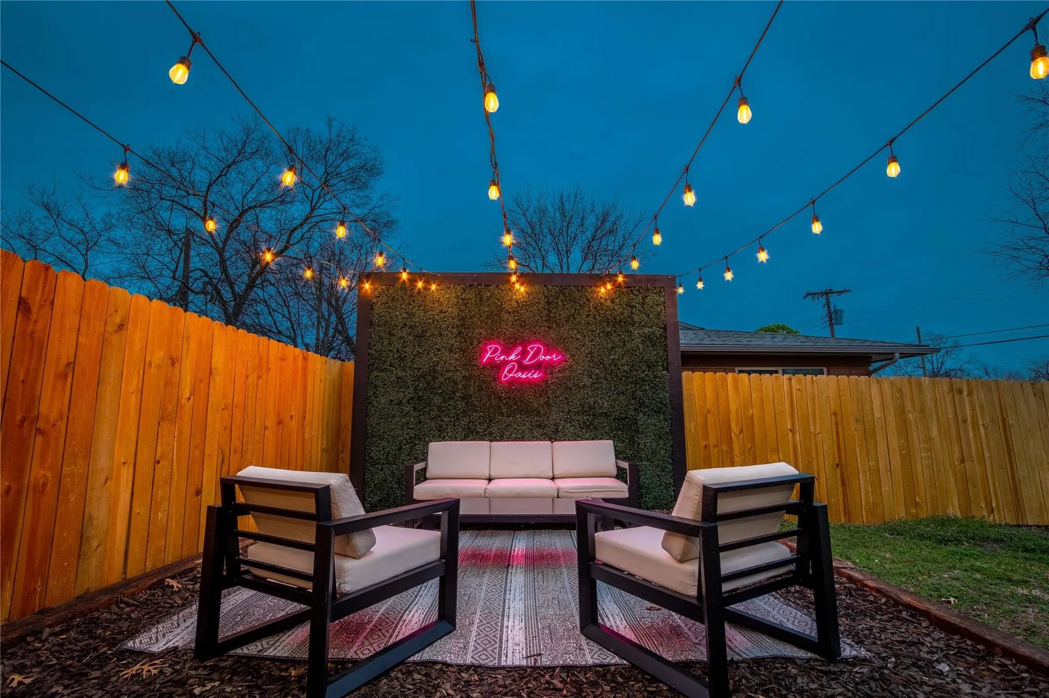 View of patio with an outdoor living space and a fenced backyard