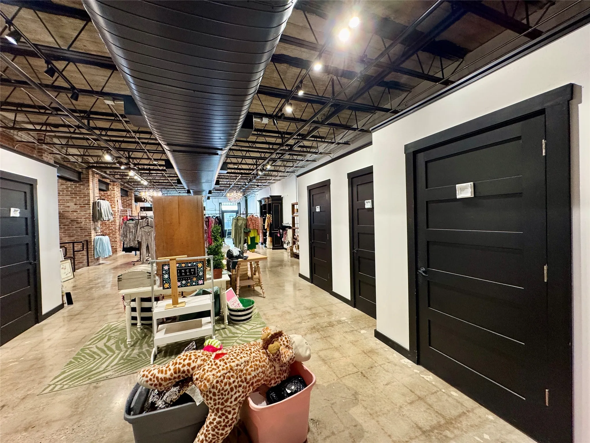 Building lobby featuring brick wall