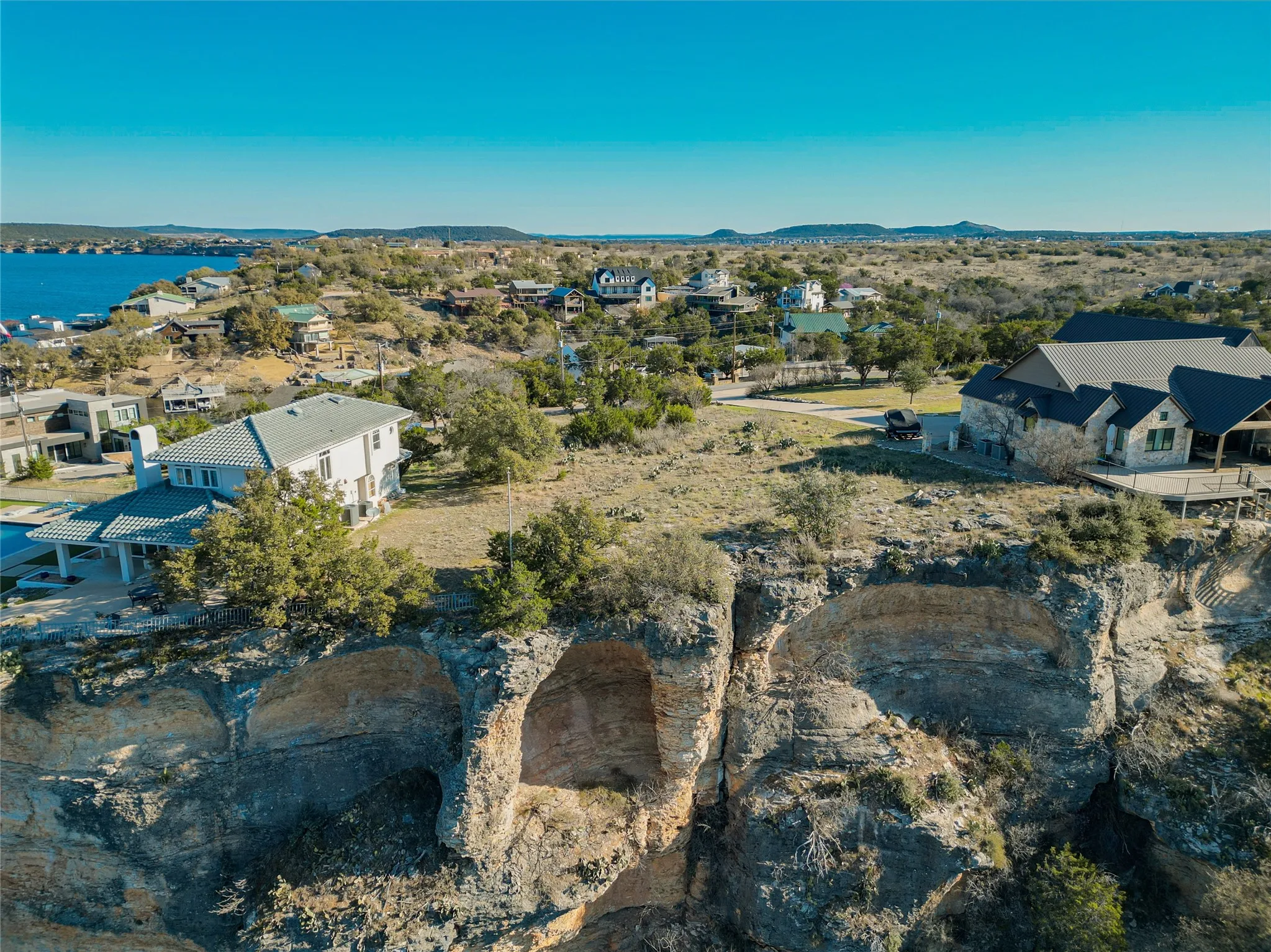 Birds eye view of property with a residential view and a mountain view