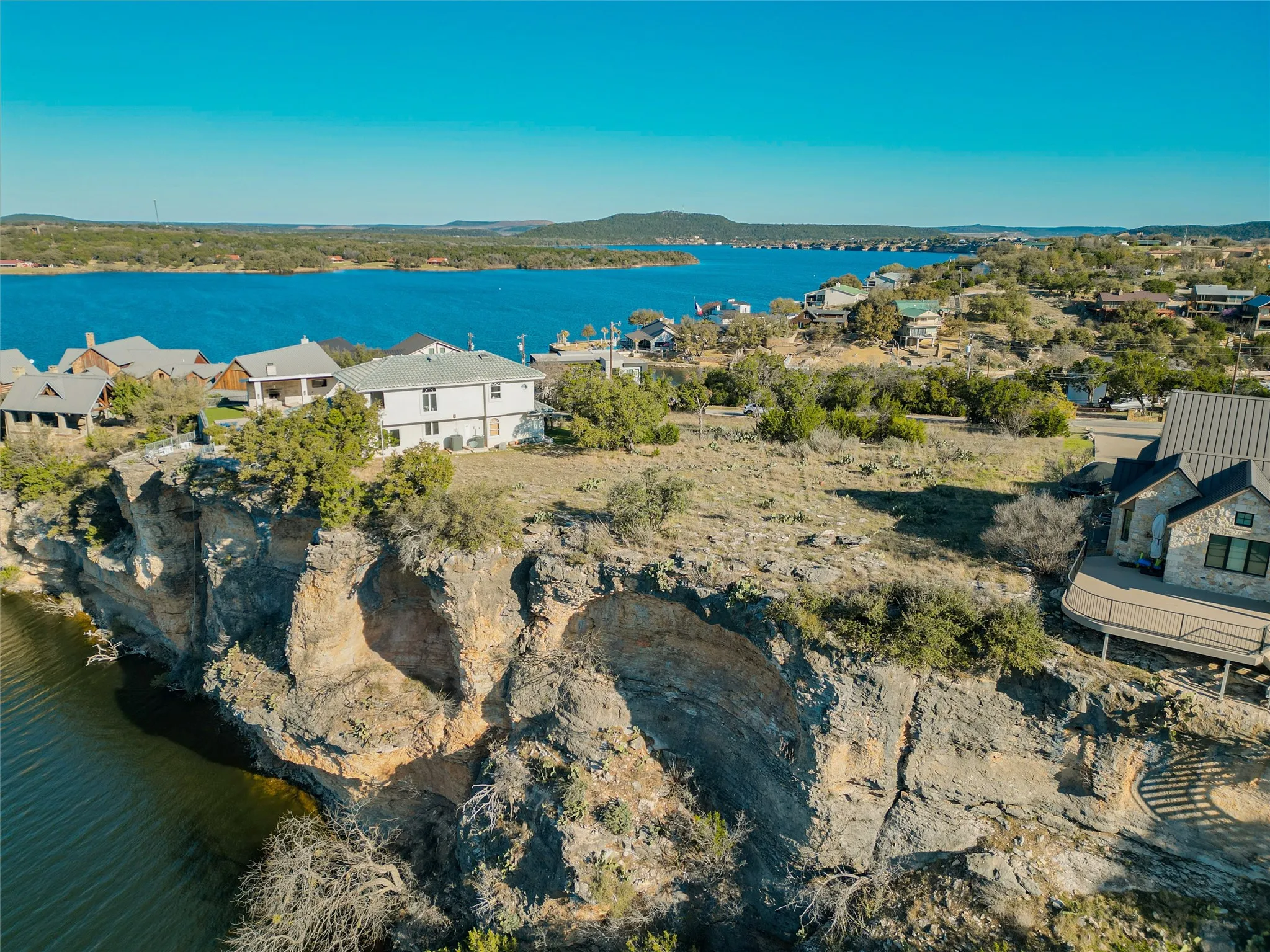 Property view of water with a residential view