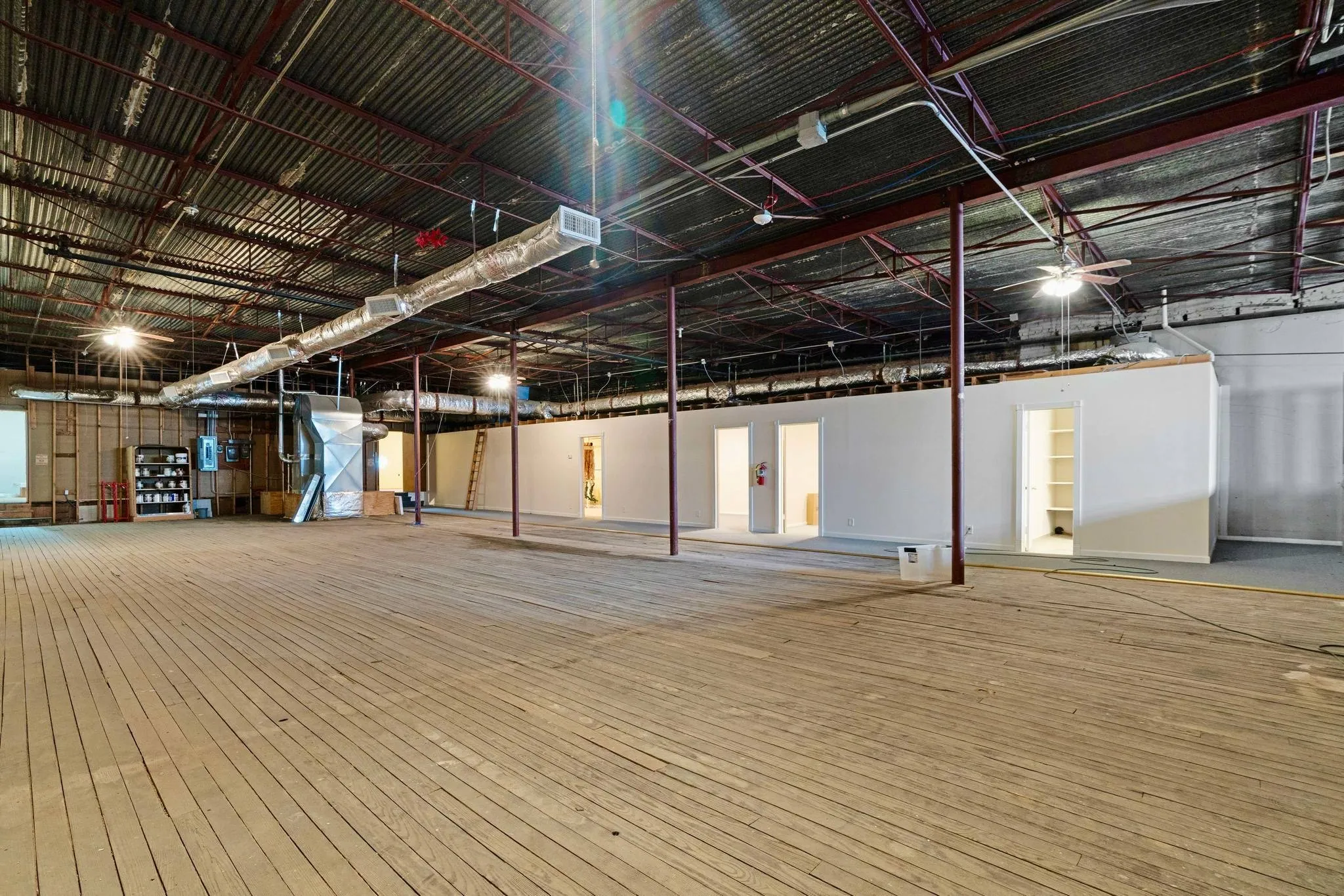 Below grade area featuring hardwood / wood-style flooring