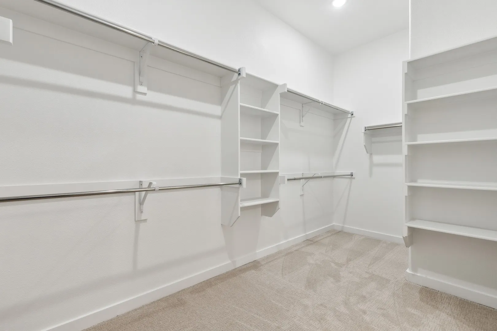 Primary Closet in the Gilmour II home plan by Trophy Signature Homes – REPRESENTATIVE PHOTO