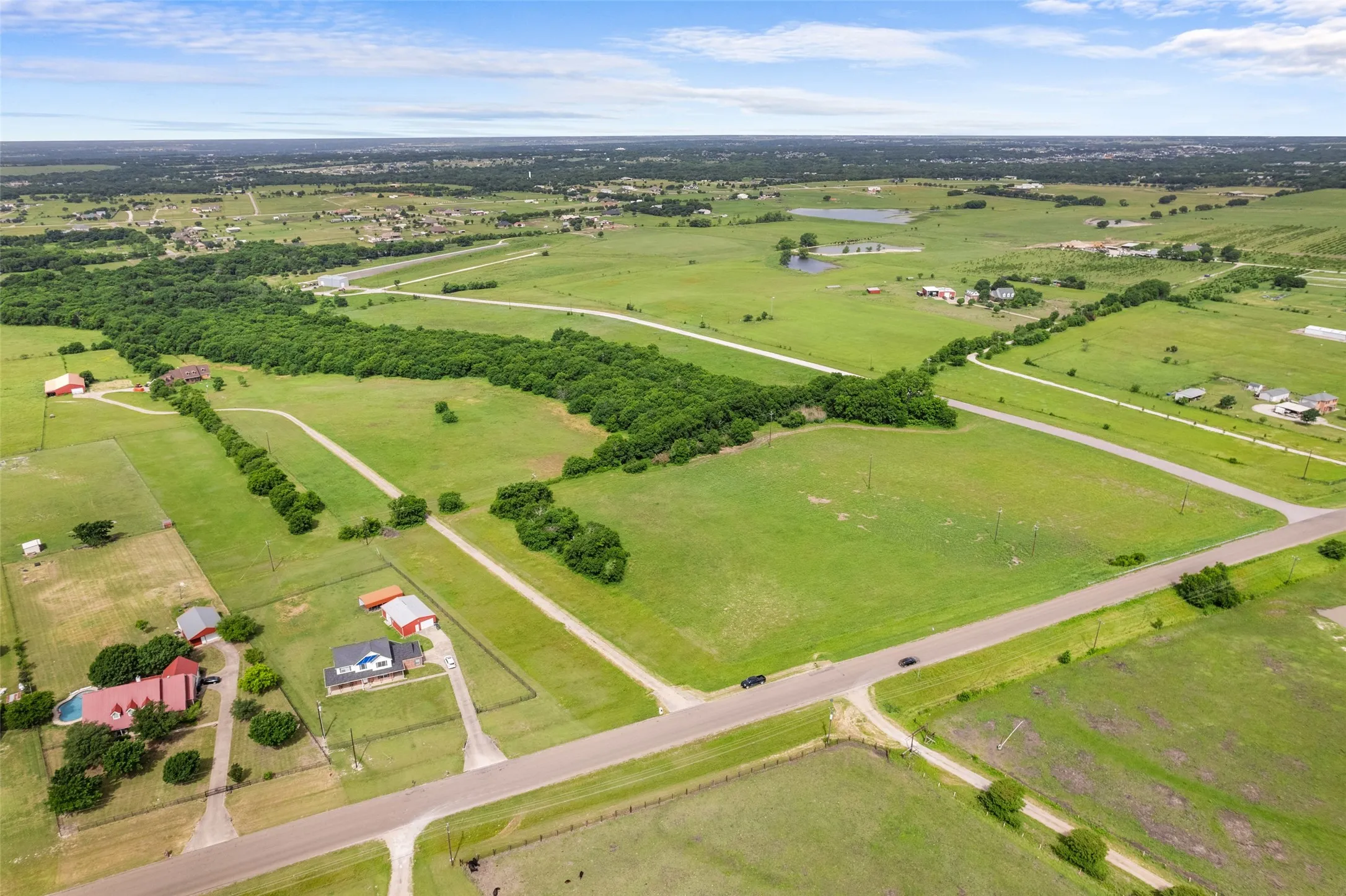 Overview of rural landscape featuring a large body of water