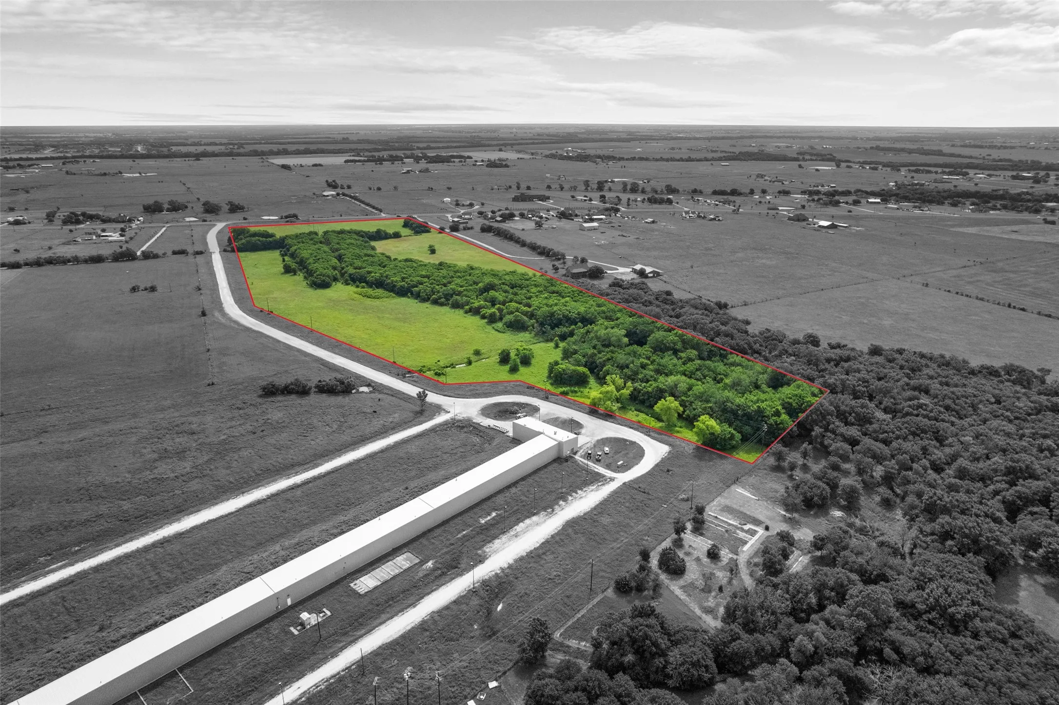 Overview of rural landscape featuring property boundaries highlighted