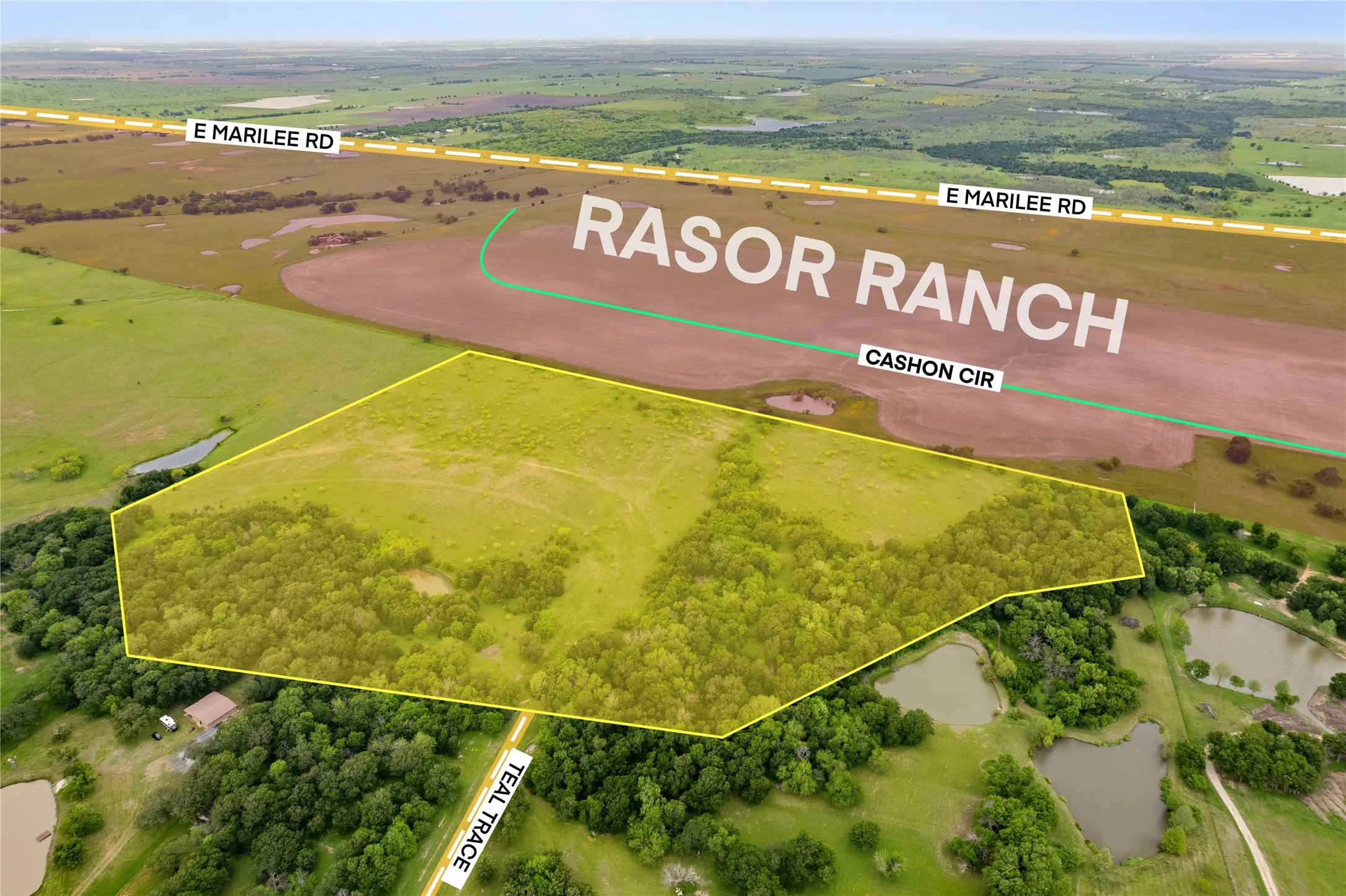 Aerial view of property's location featuring a nearby body of water and property boundaries highlighted