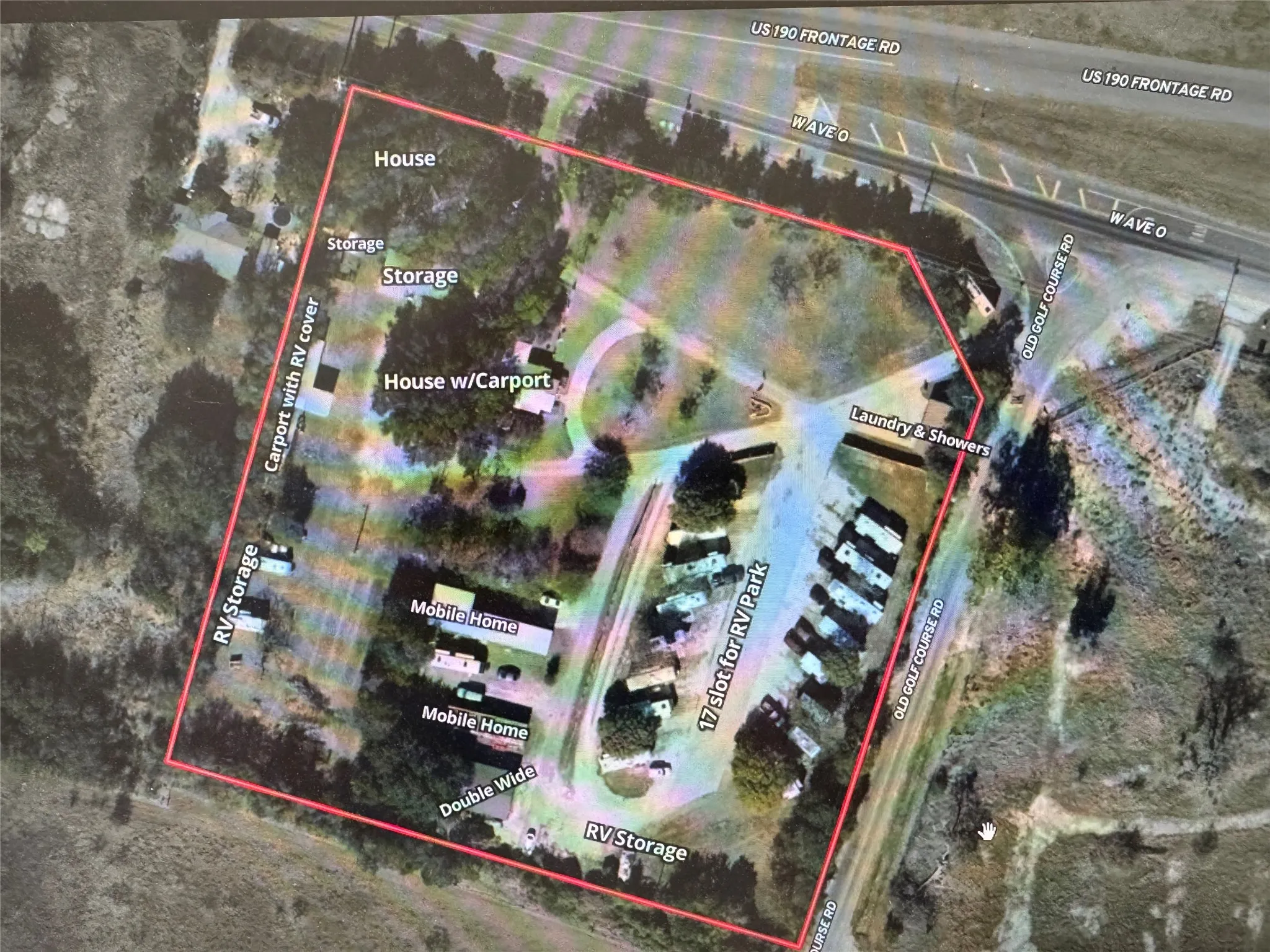 Aerial map of property and surrounding area featuring property boundaries highlighted