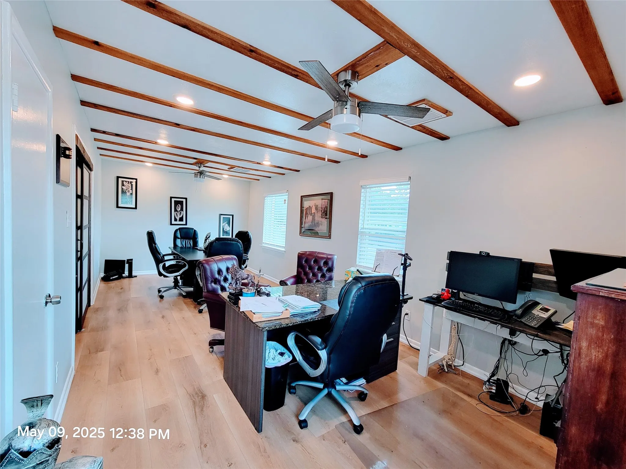 Office with beam ceiling, ceiling fan, light wood finished floors, recessed lighting, and baseboards