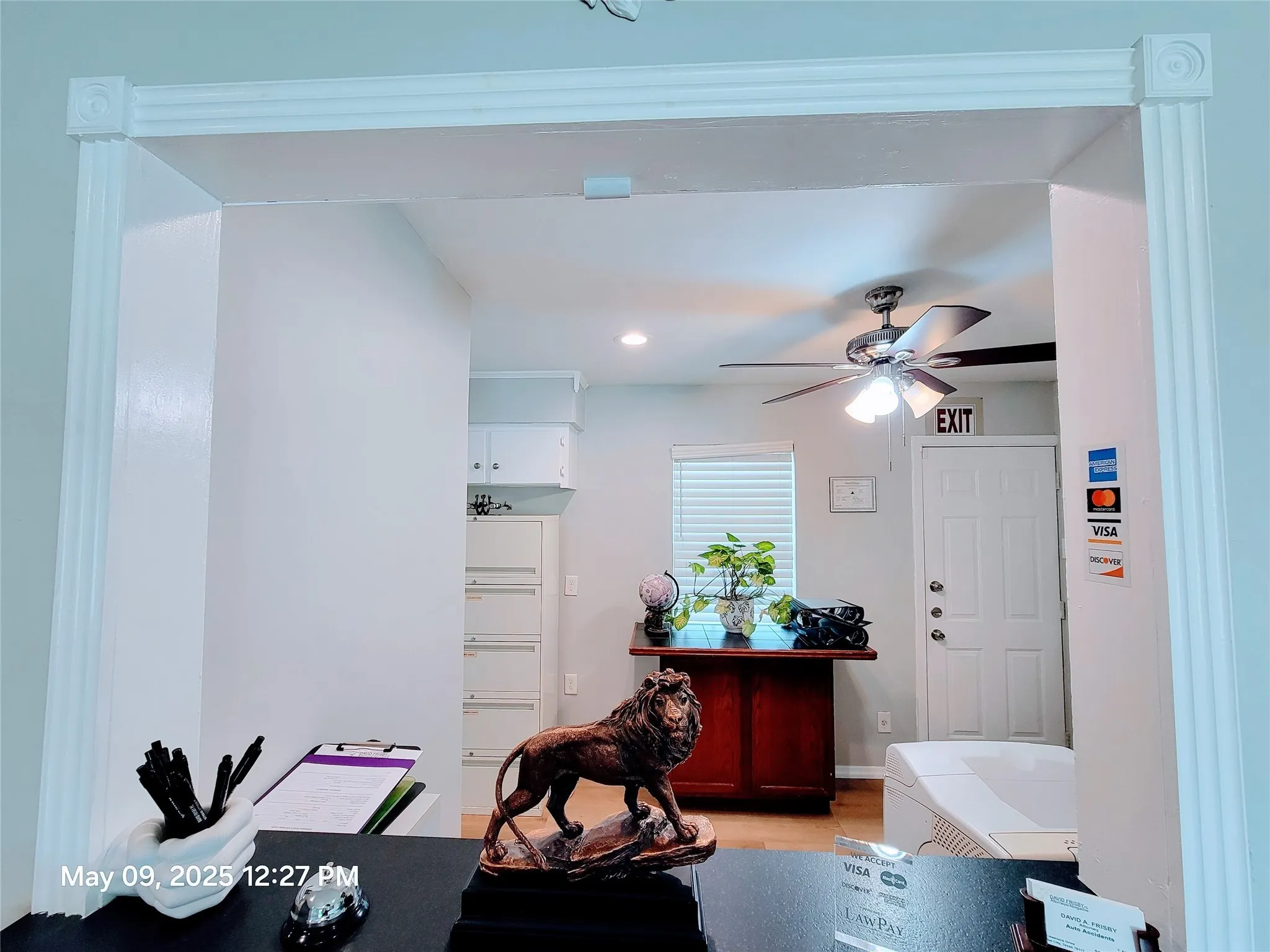 Office area with light wood-style floors, ceiling fan, and recessed lighting