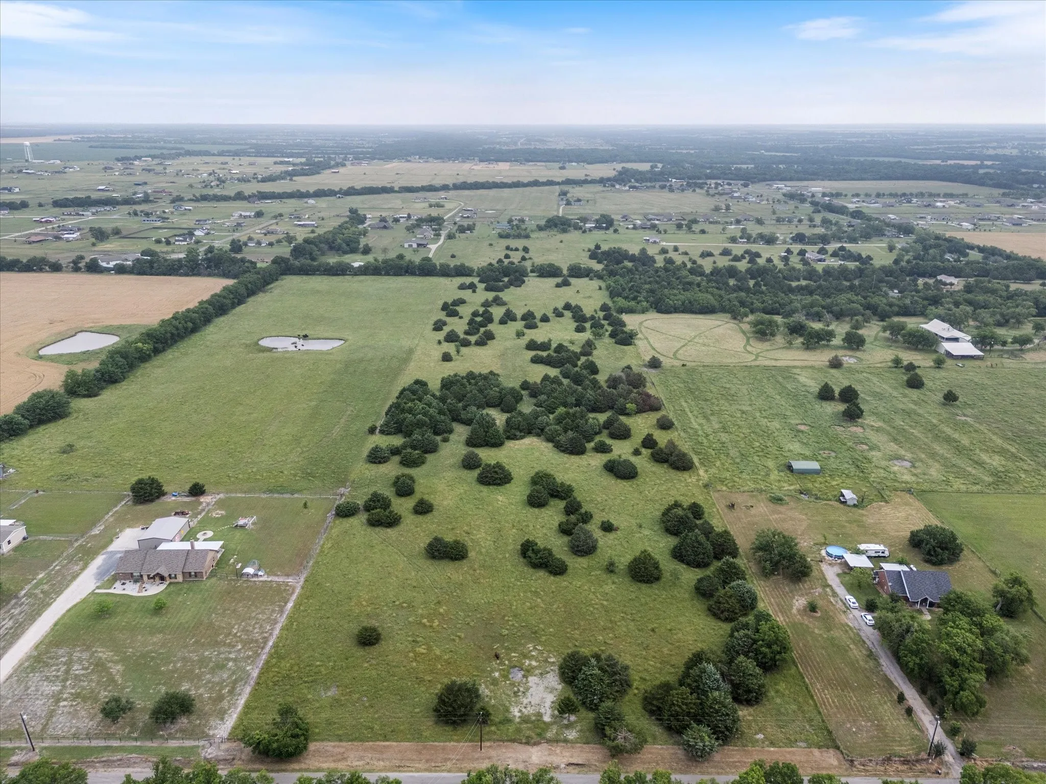 Aerial overview of property's location with rural landscape