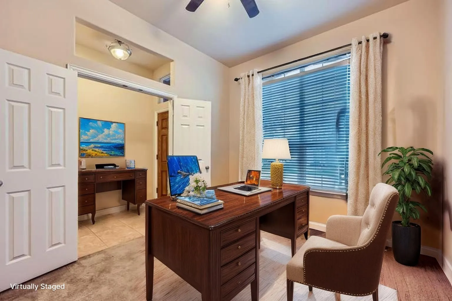 Office featuring baseboards and ceiling fan