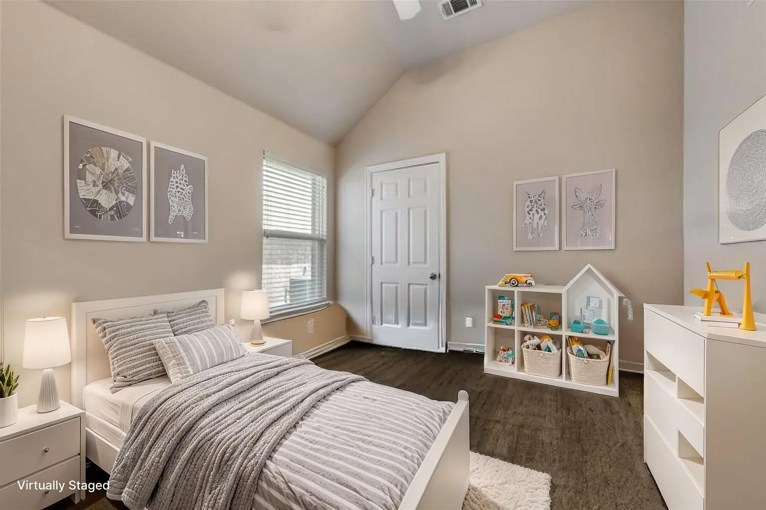 Bedroom with vaulted ceiling, dark wood finished floors, and baseboards