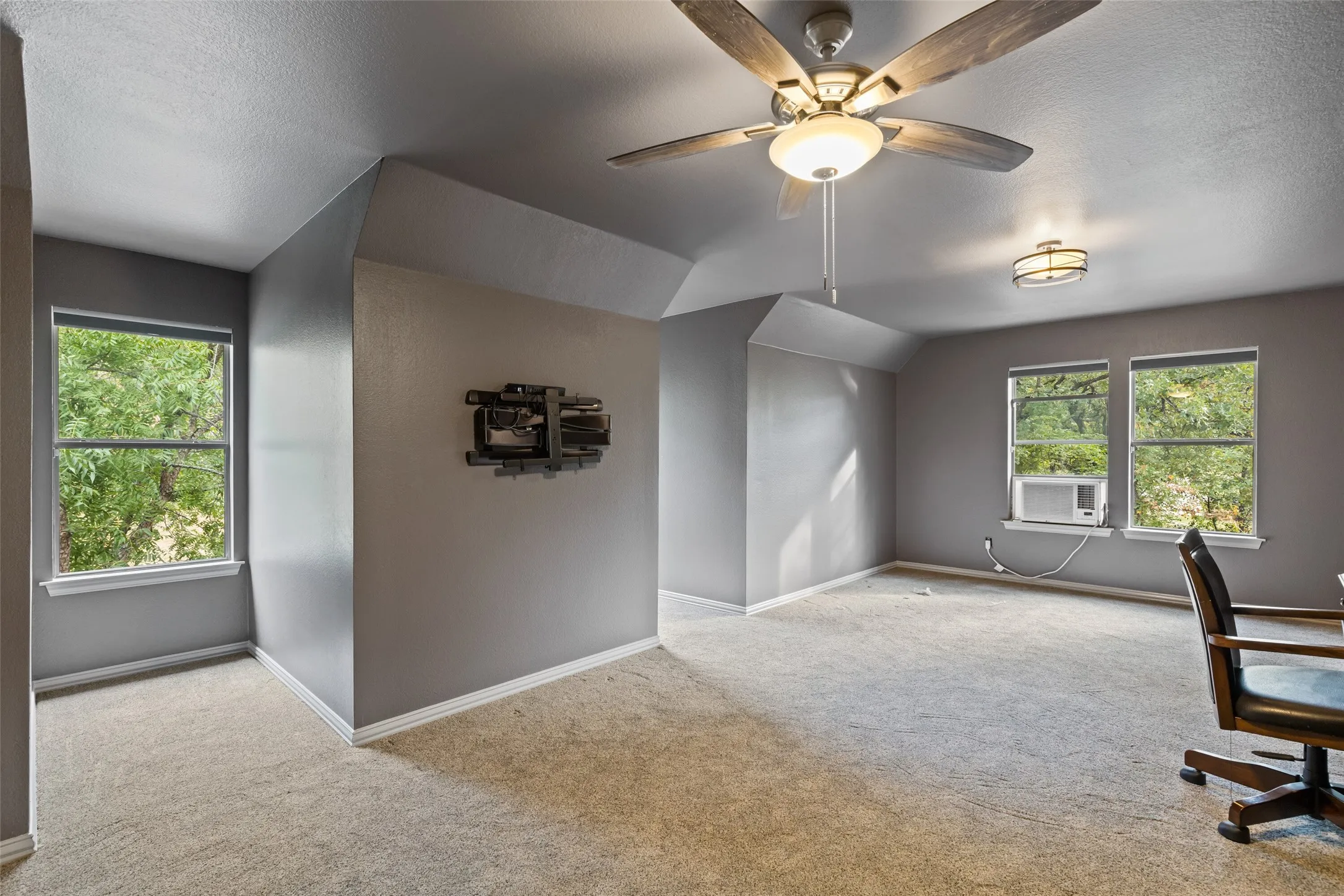 Over the garage...could be a classroom, extra office, workout area, or music room