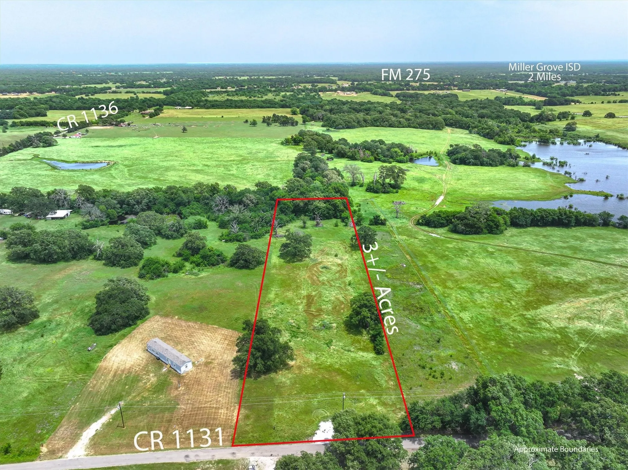 View of property location with a nearby body of water and aprox property boundaries highlighted