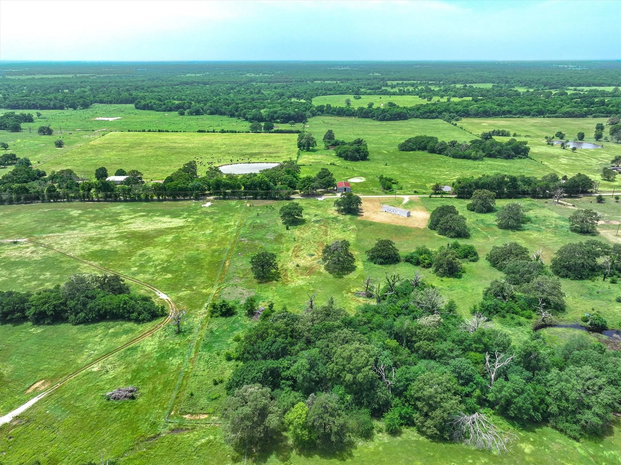 Aerial overview of property's location featuring rural landscape