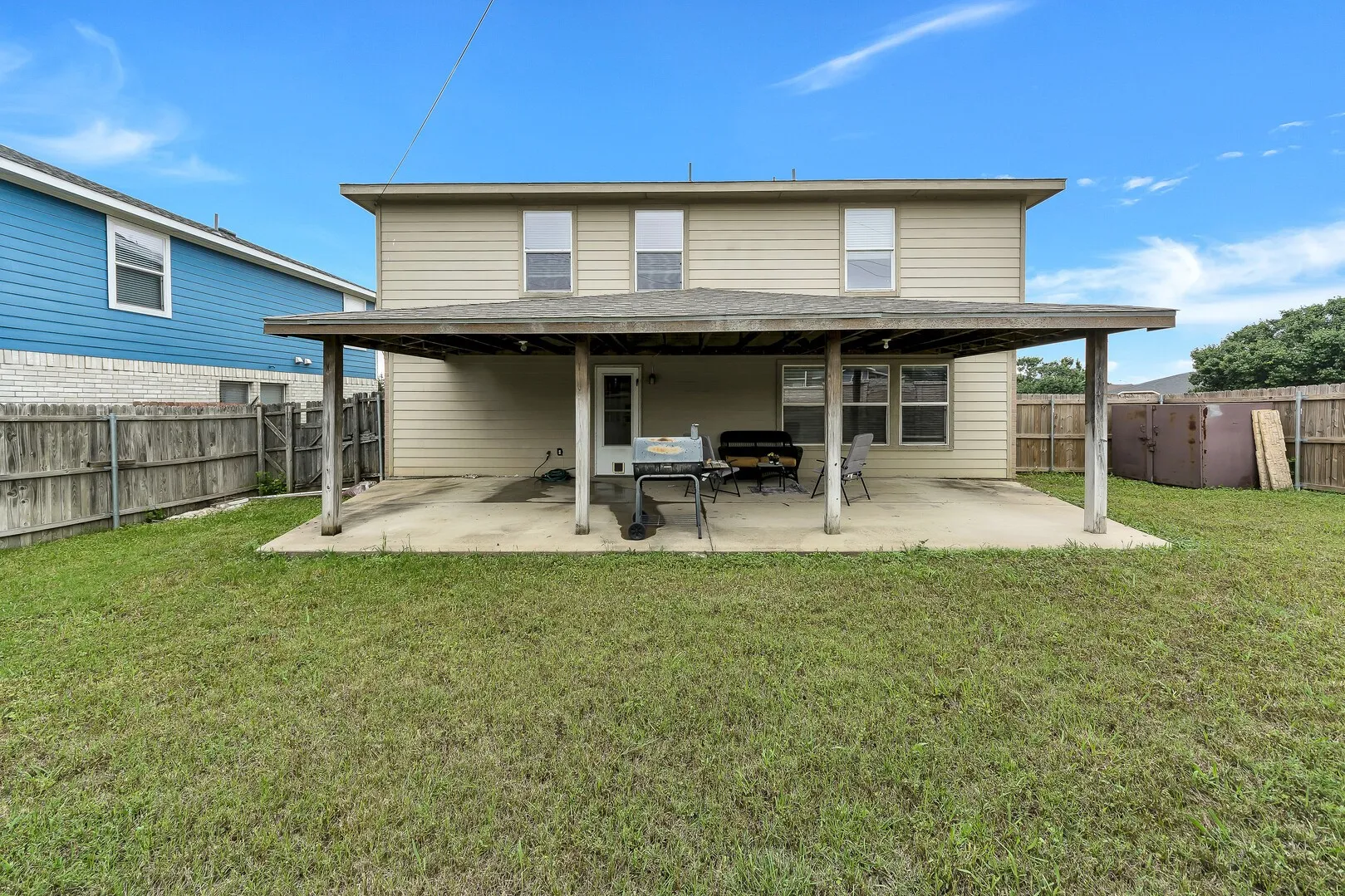 Back of property featuring a patio