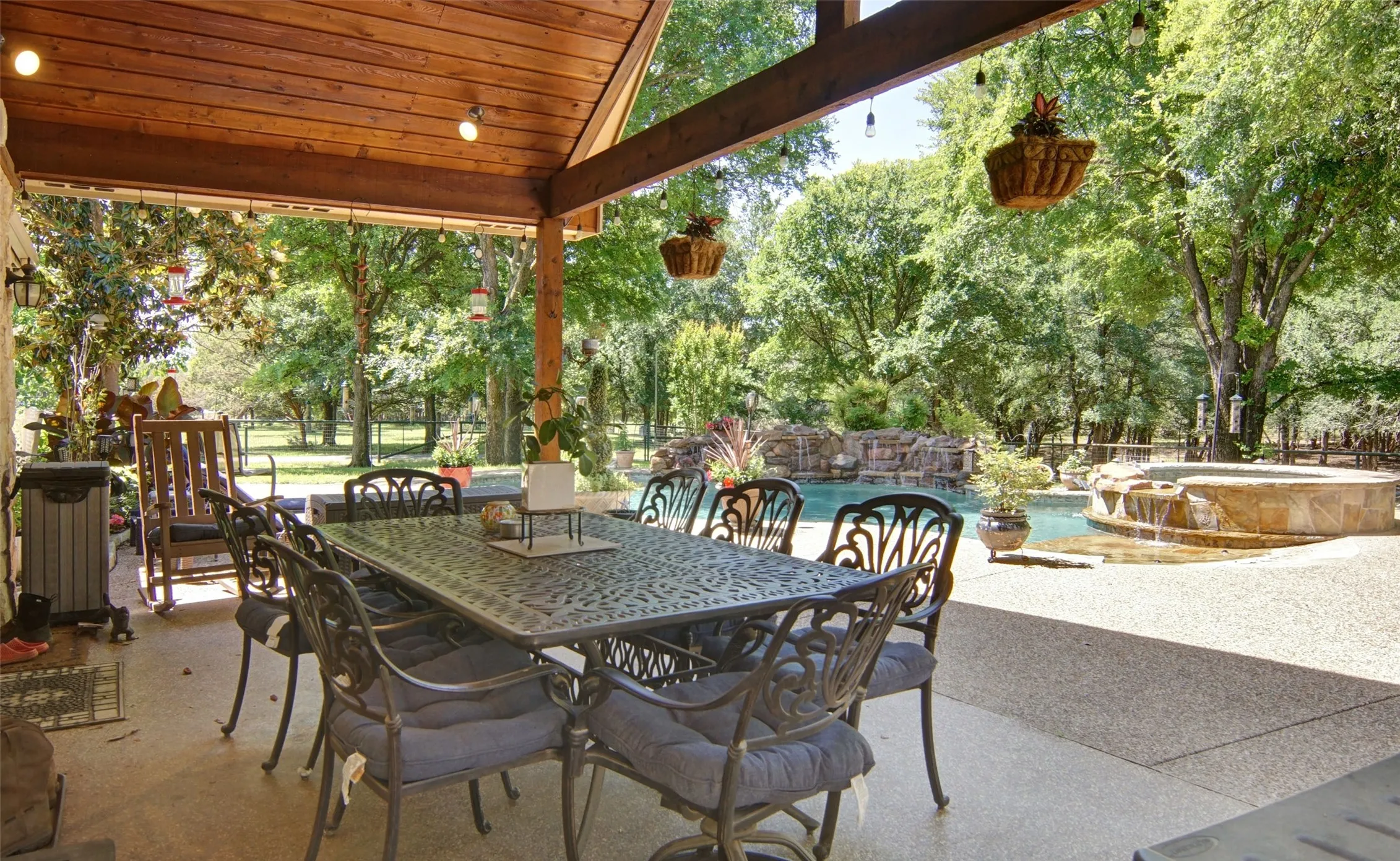 Where friends meet. Right outside the back door you can enjoy the sounds of nature. The pool fountain and the sounds of your family enjoying the peace and tranquility of your little slice of country life.