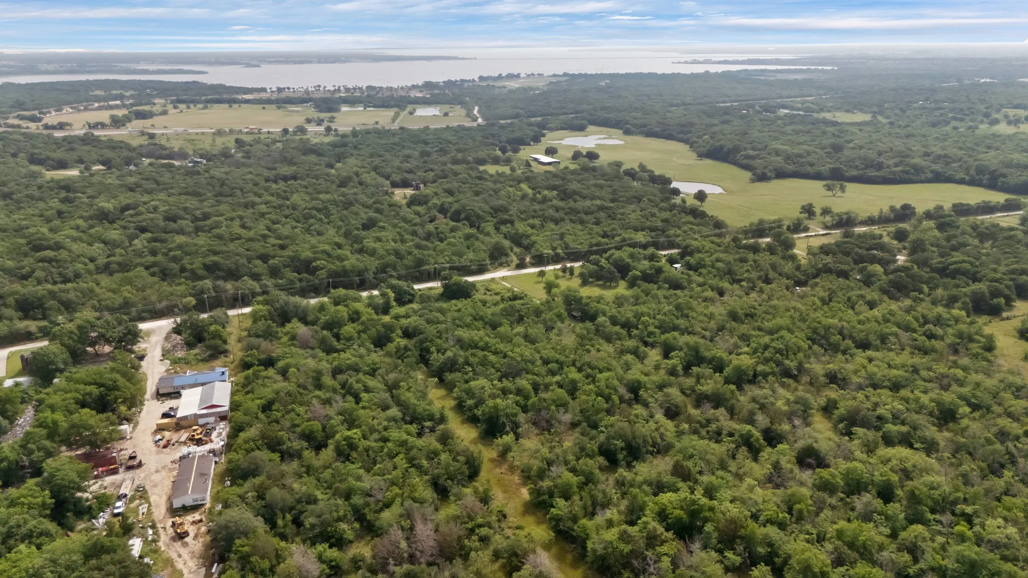Drone / aerial view of a heavily wooded area