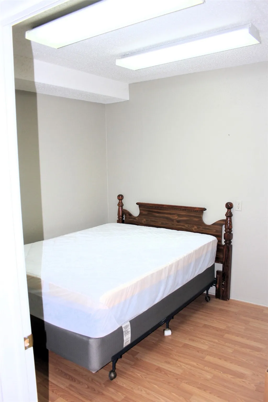 Bedroom with wood finished floors