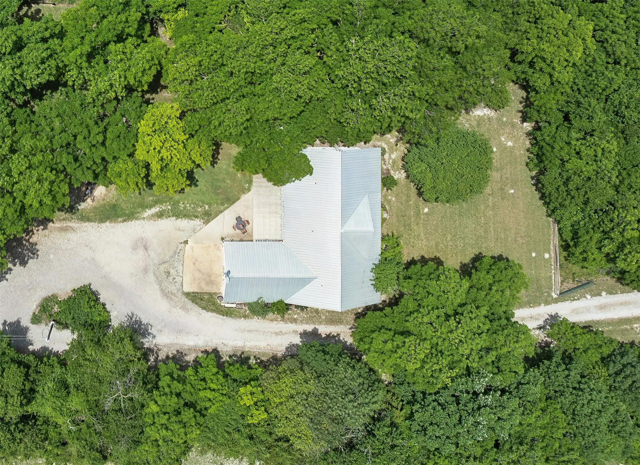 Breathtaking 16+ Acre Oasis in Nature, Surrounded by Towering Pines, Majestic Pecan Trees, and More – Your Private Retreat Awaits!