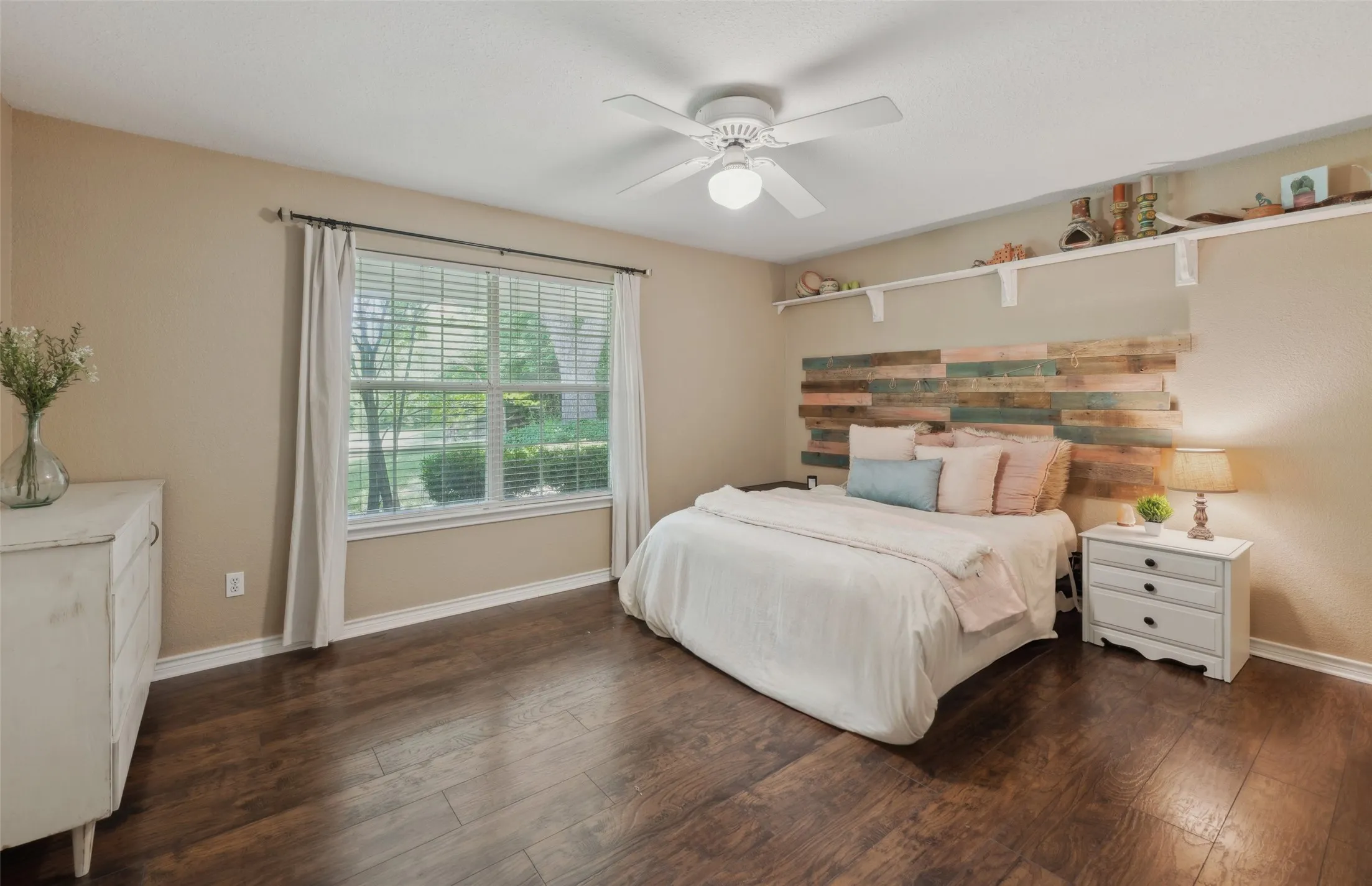 Large Secondary Bedroom with Wood Flooring
