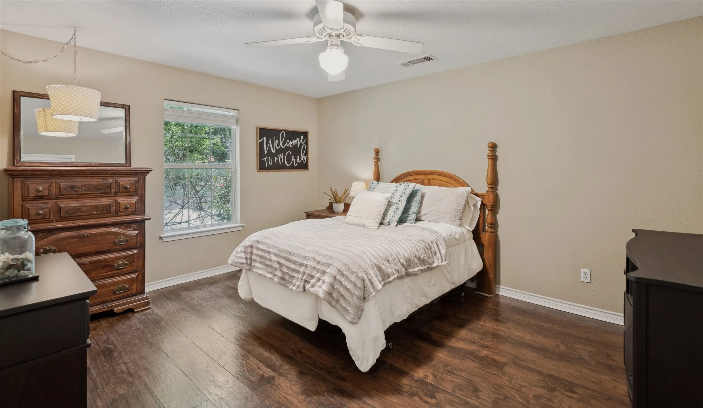 Large Secondary Bedroom with Wood Flooring