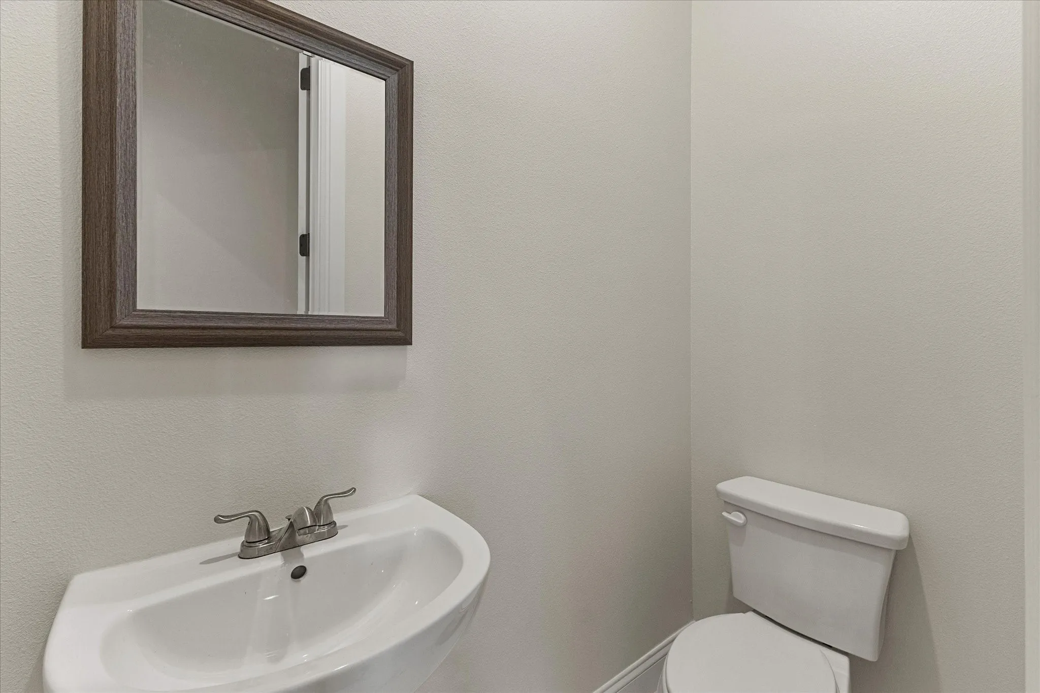 Bathroom with toilet and a sink