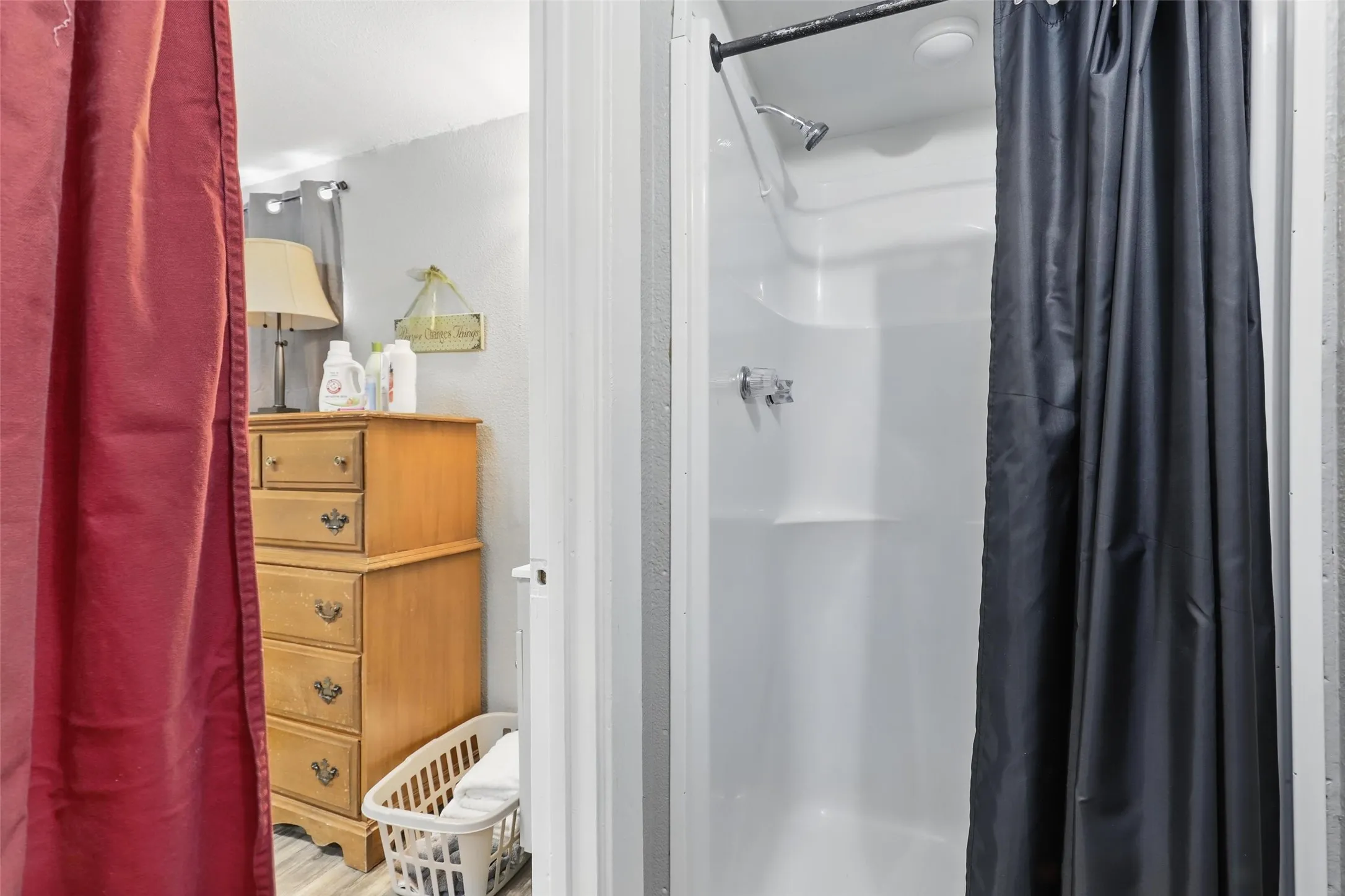 Bathroom with a shower with curtain