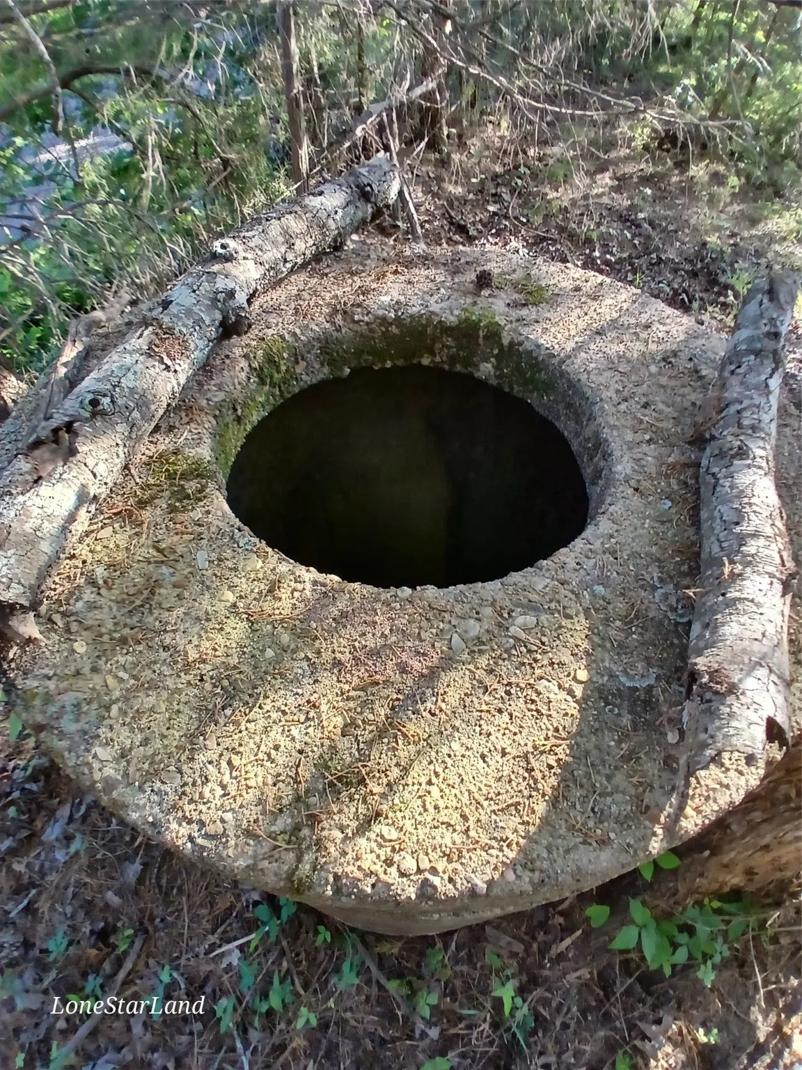 Bored water well near road