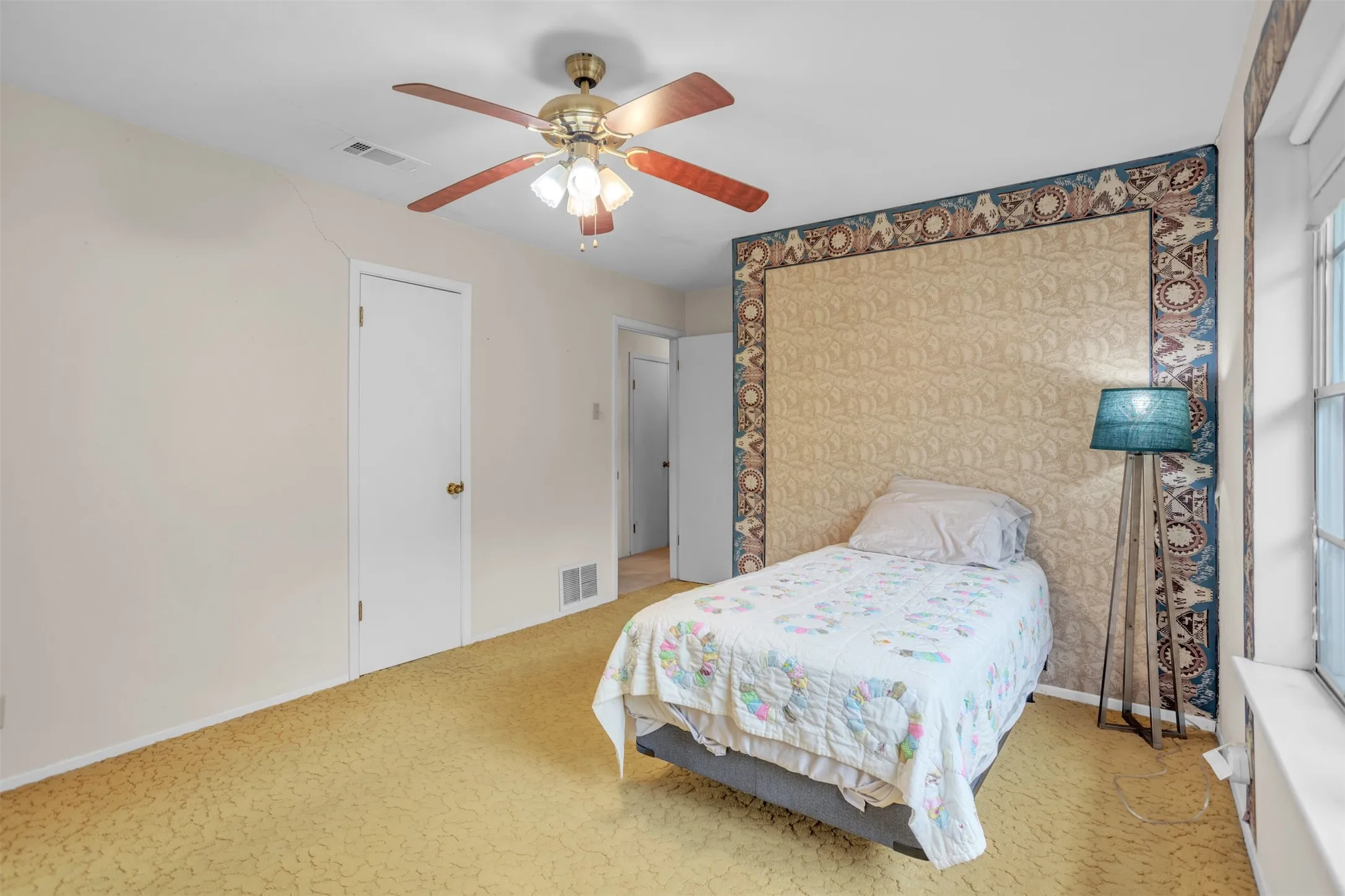 Bedroom featuring ceiling fan