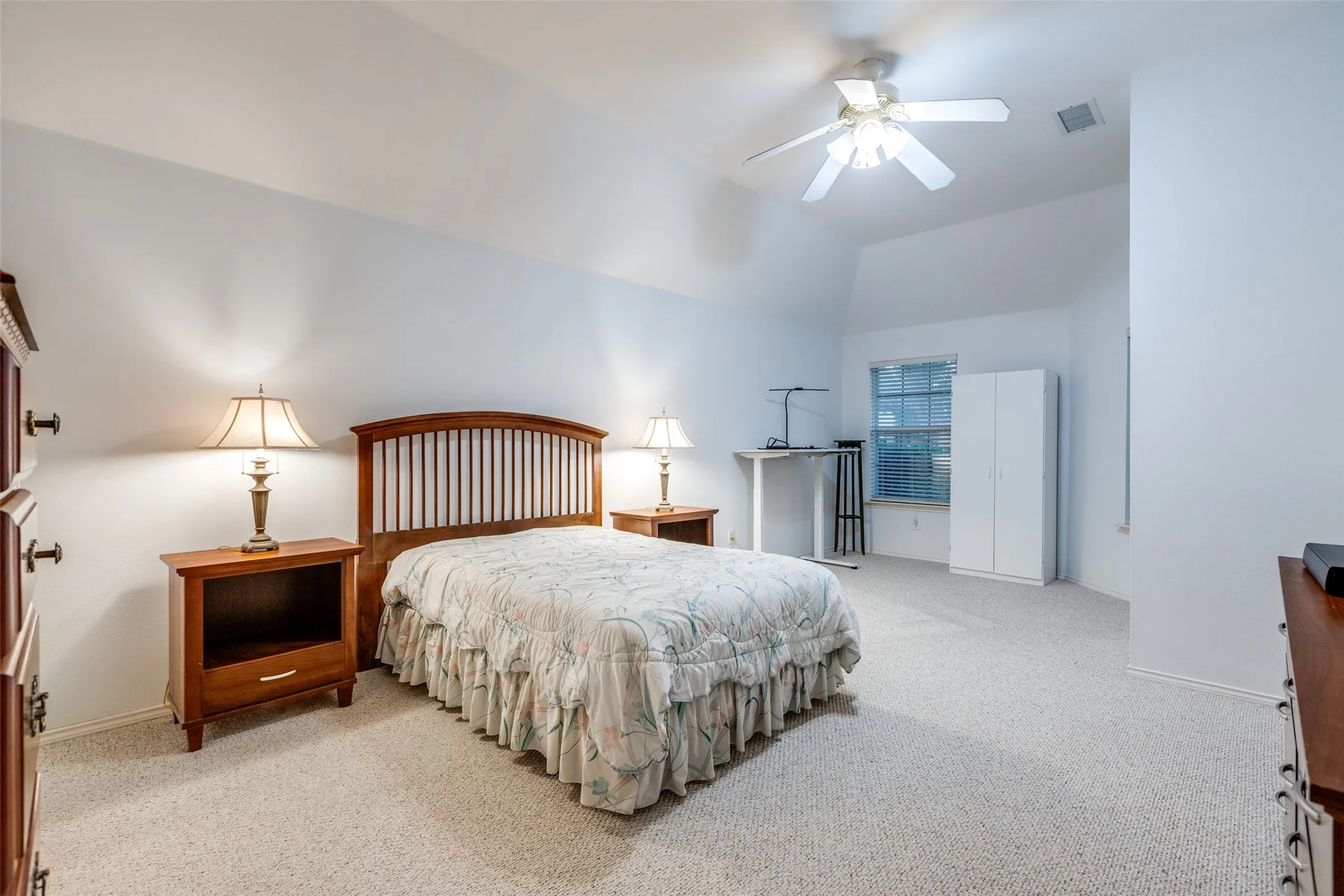 This HUGE, beautifully furnished master, primary suite is unbelieveable.  Perfect sitting area or maybe a stationary bike works for you.  This room is split from the other two bedrooms.  Private!