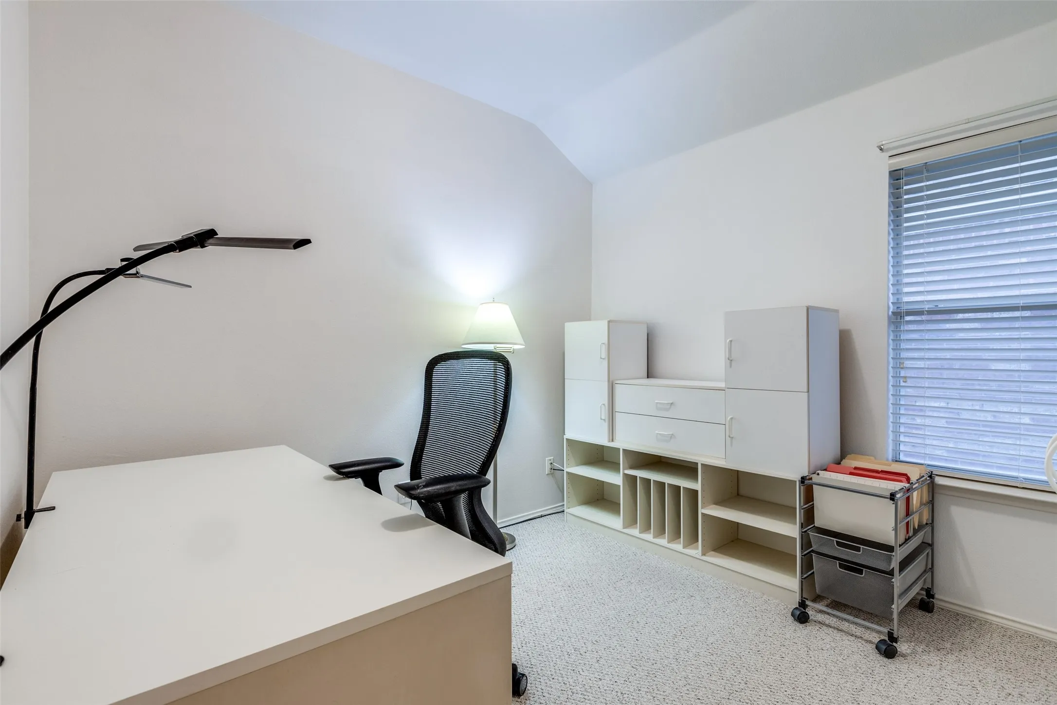 This secondary bedroom is the perfect home office.  Bring your computer and files and get to work.