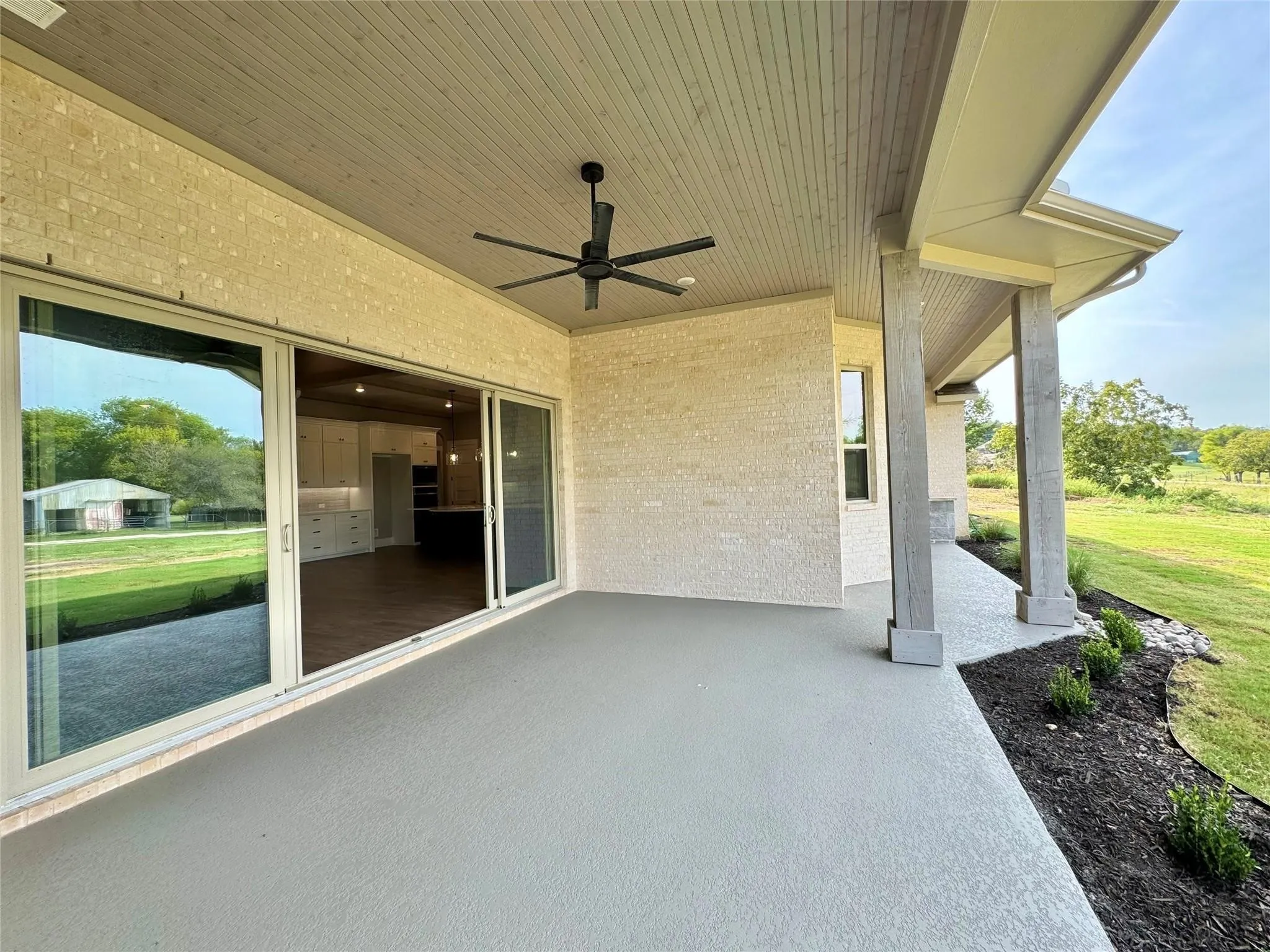 View of patio / terrace featuring ceiling fan