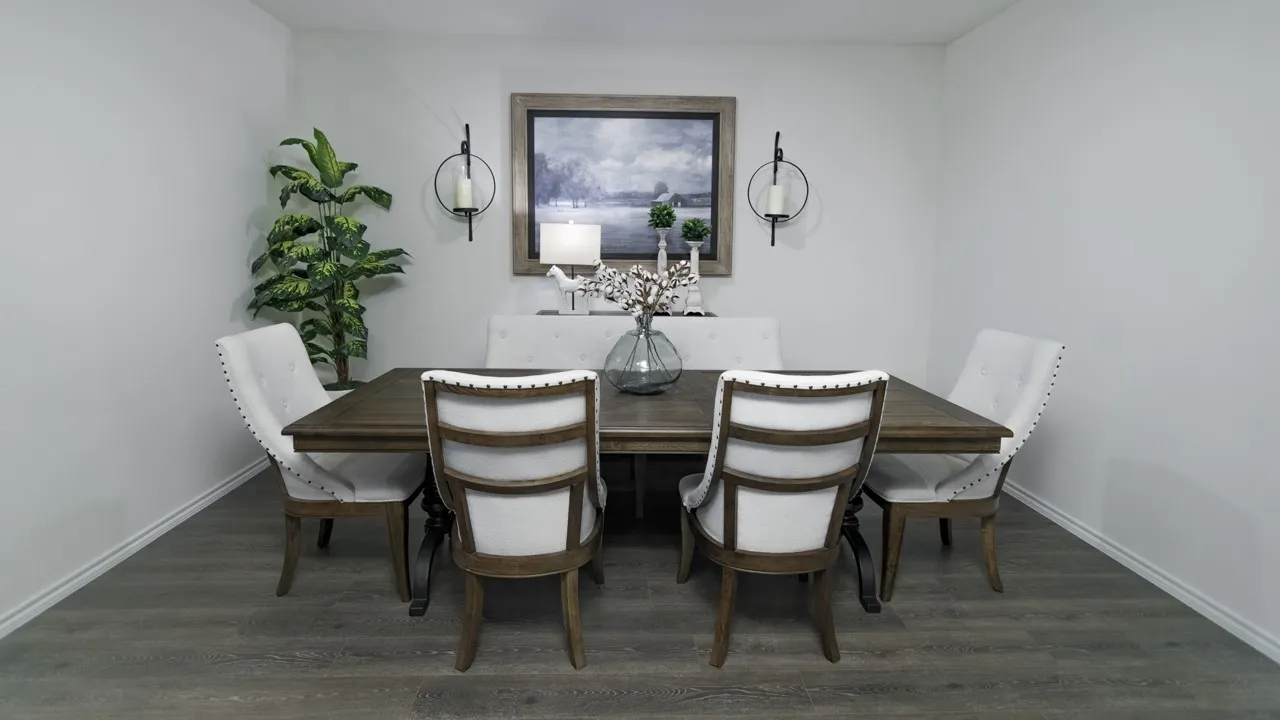 Dining room featuring dark wood-style floors