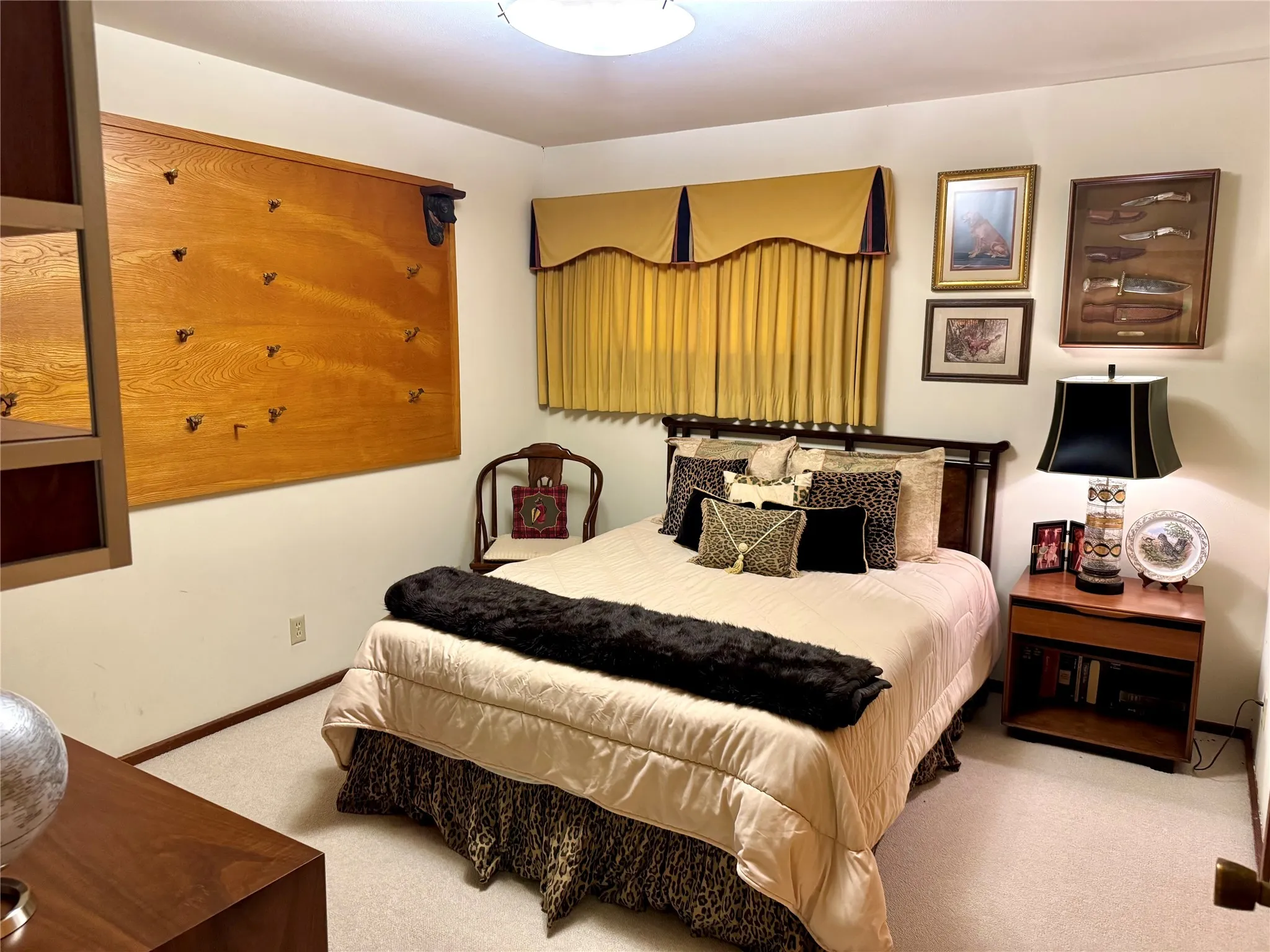 Carpeted bedroom with baseboards