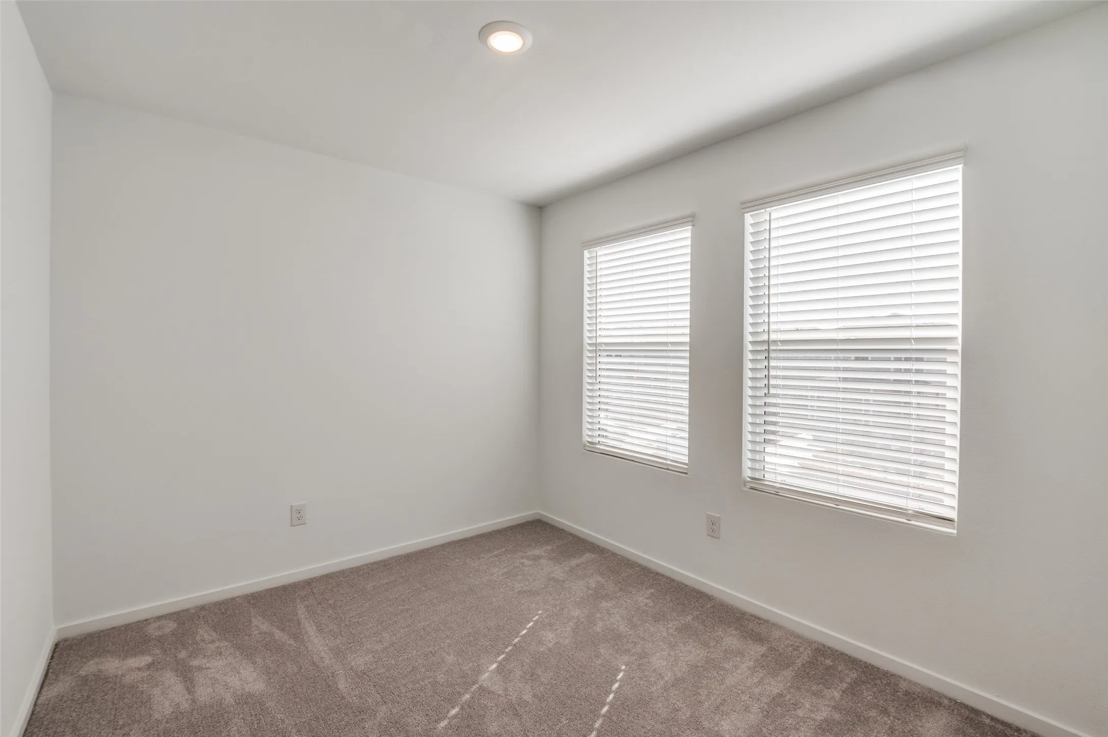 Unfurnished room with carpet floors